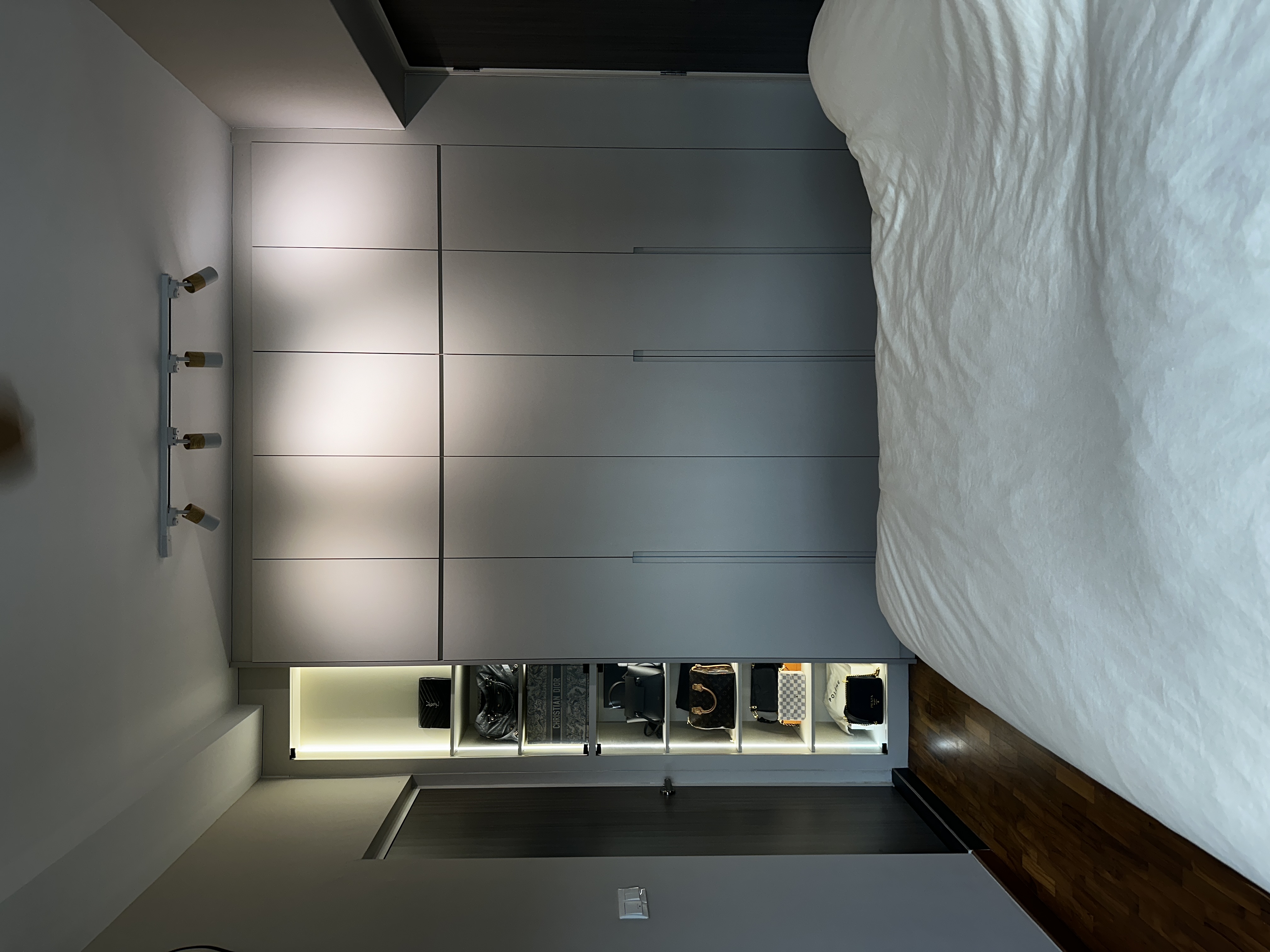 Our-cosy-bedroom-with-minimal-carpentry-with-a-bag-display-cabinet-