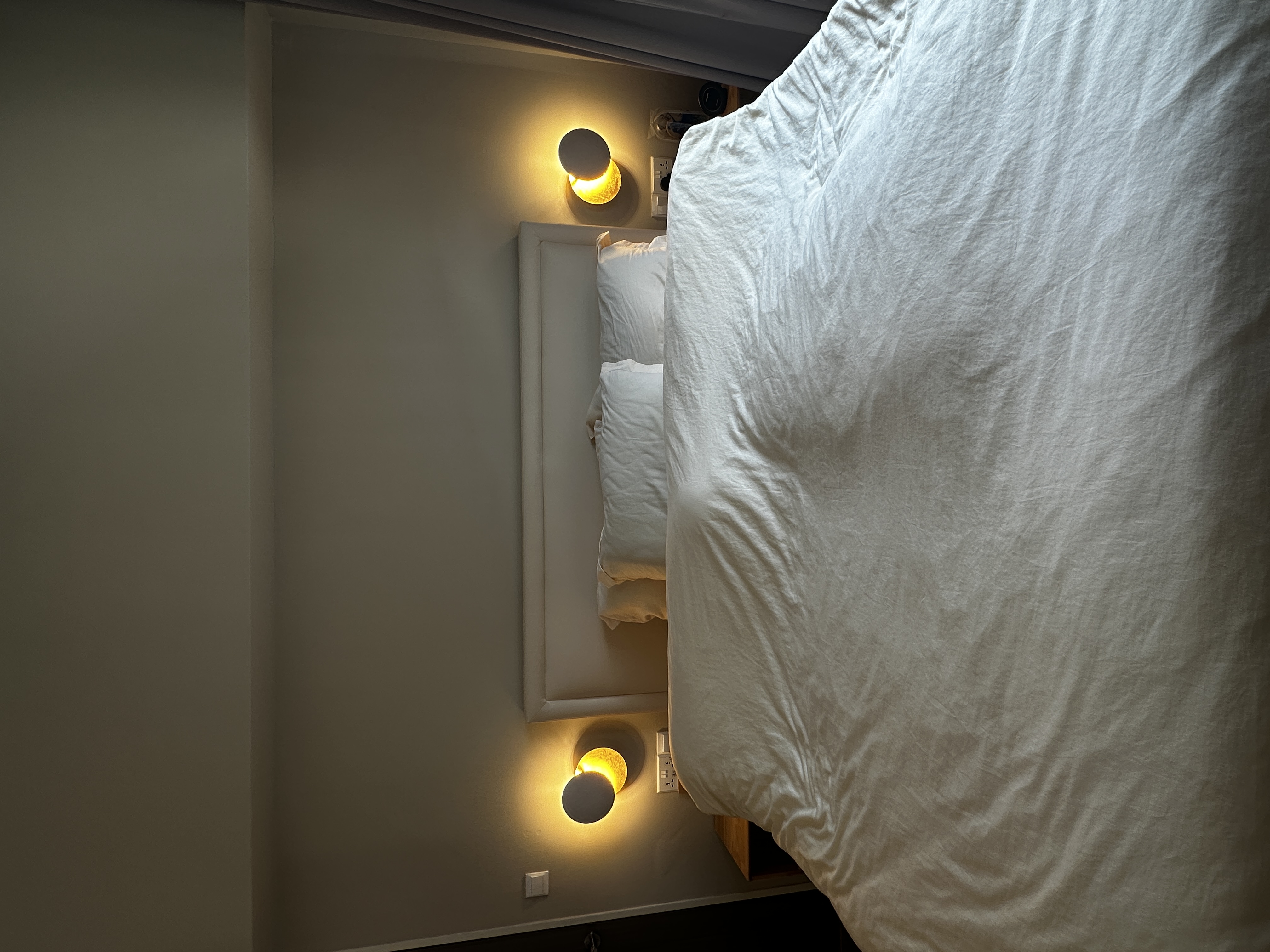 Our cosy bedroom with minimal carpentry with a bag display cabinet  - modern bedroom, cozy bed, white comforter, soft