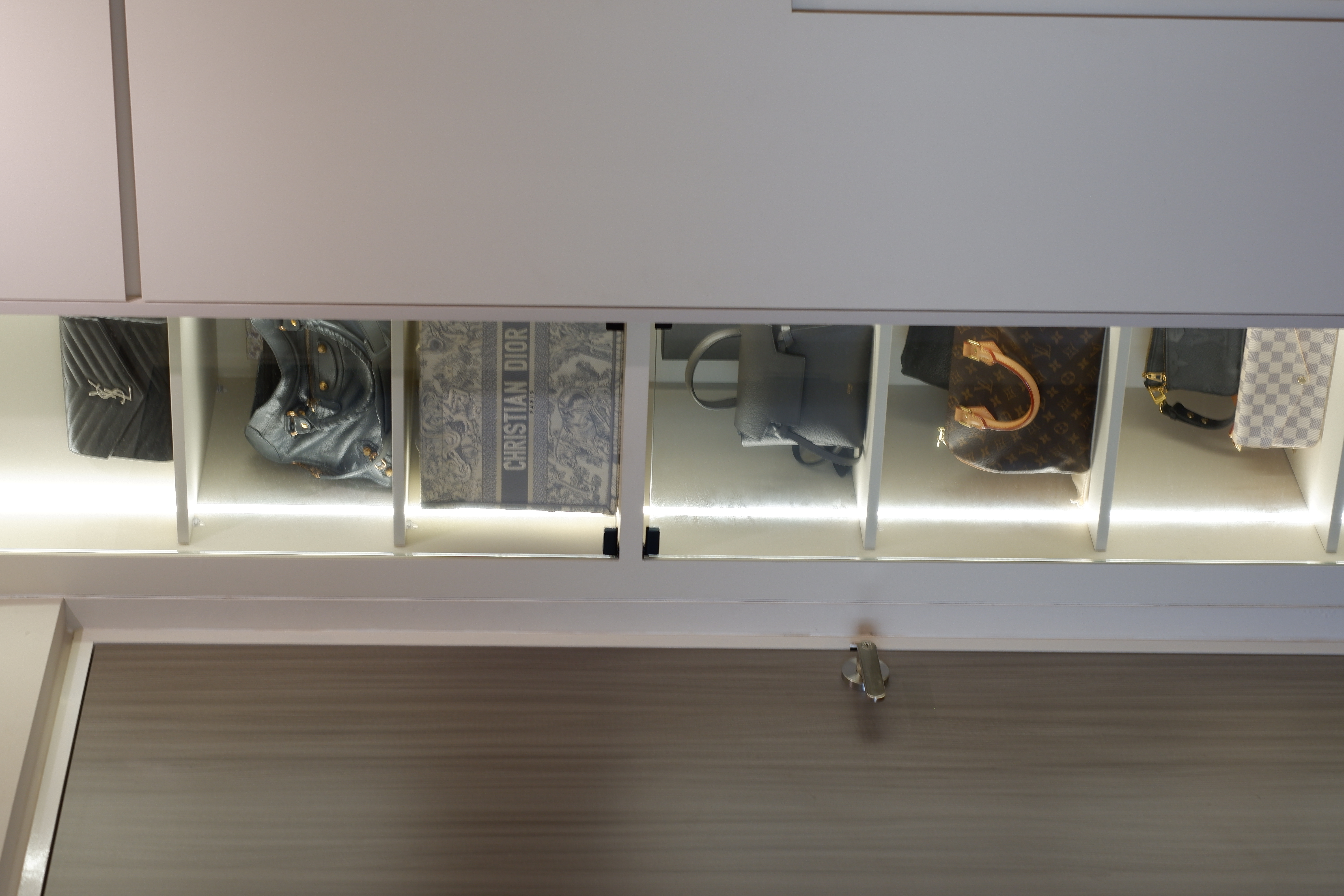 Our-cosy-bedroom-with-minimal-carpentry-with-a-bag-display-cabinet-