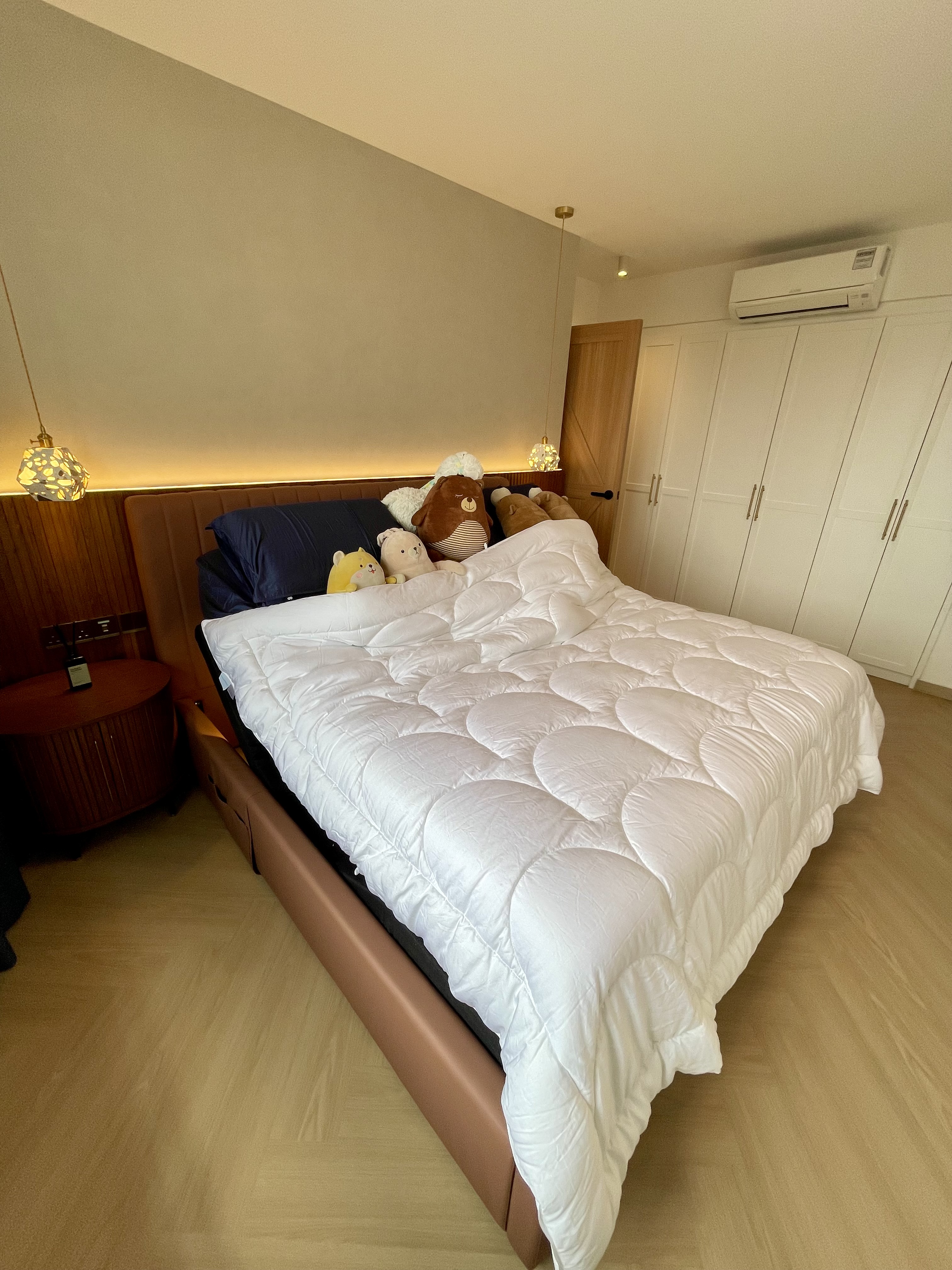 A Cosy Sanctuary: Our Slumber Haven With A Concealed Bathroom & Vanity - Modern bedroom with plush teddy bears, white and