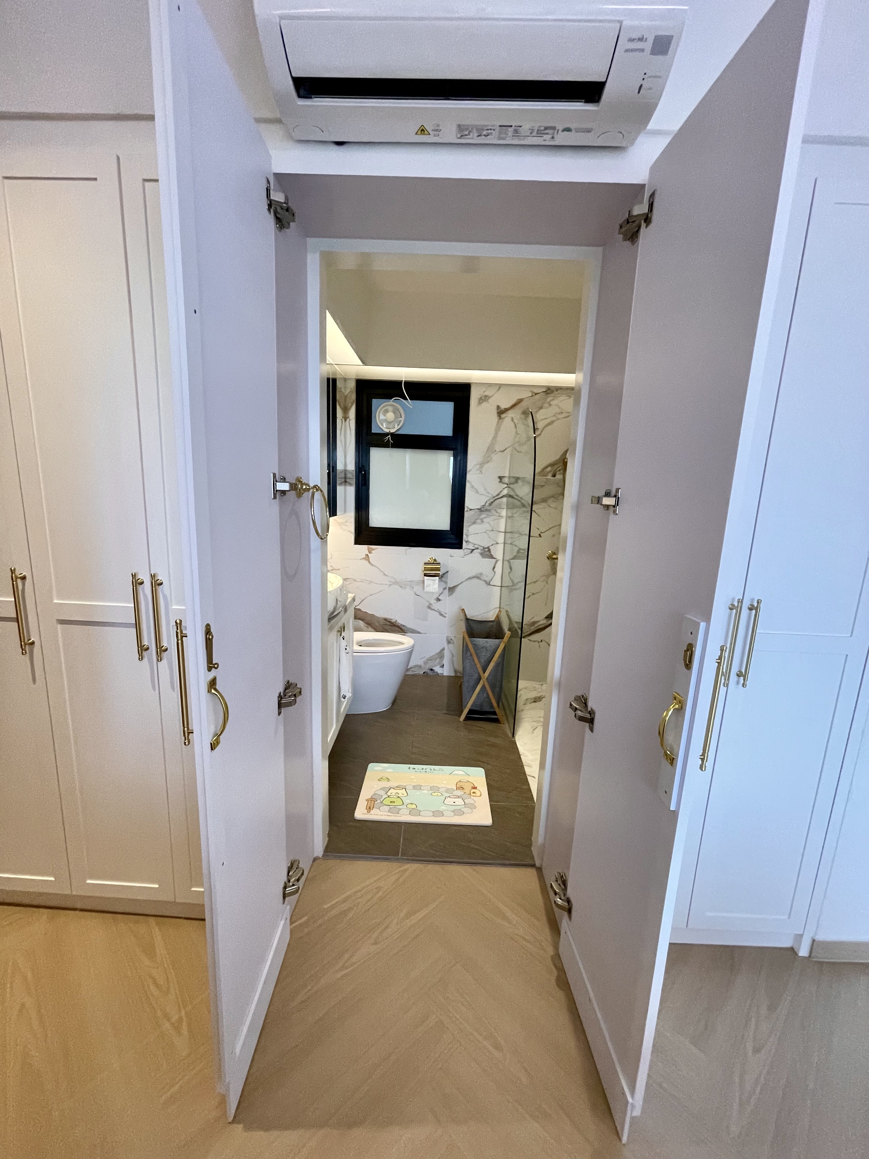 A Cosy Sanctuary: Our Slumber Haven With A Concealed Bathroom & Vanity - White bathroom with modern fixtures, beige