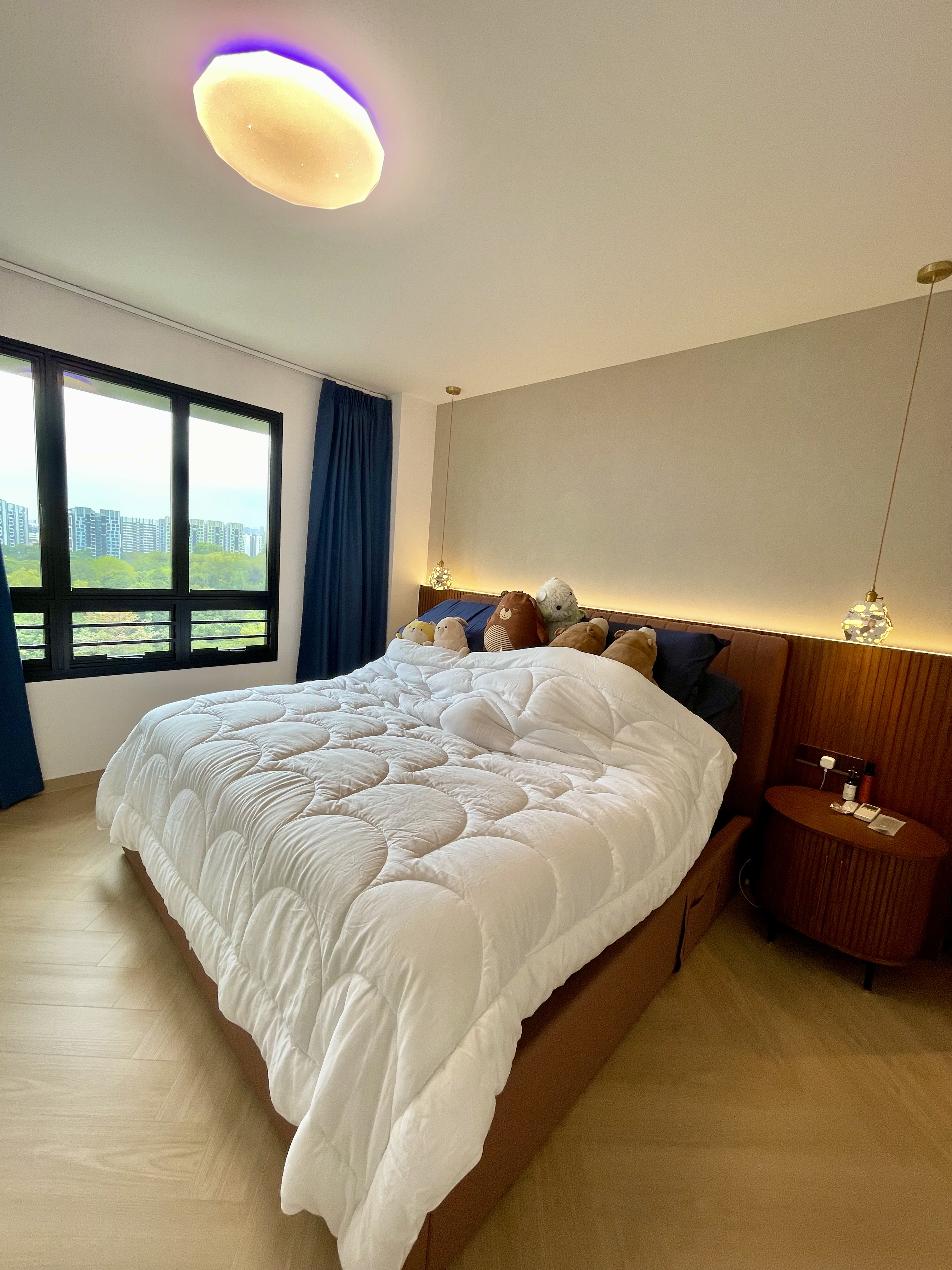 A Cosy Sanctuary: Our Slumber Haven With A Concealed Bathroom & Vanity - Modern bedroom with large bed, white comforter