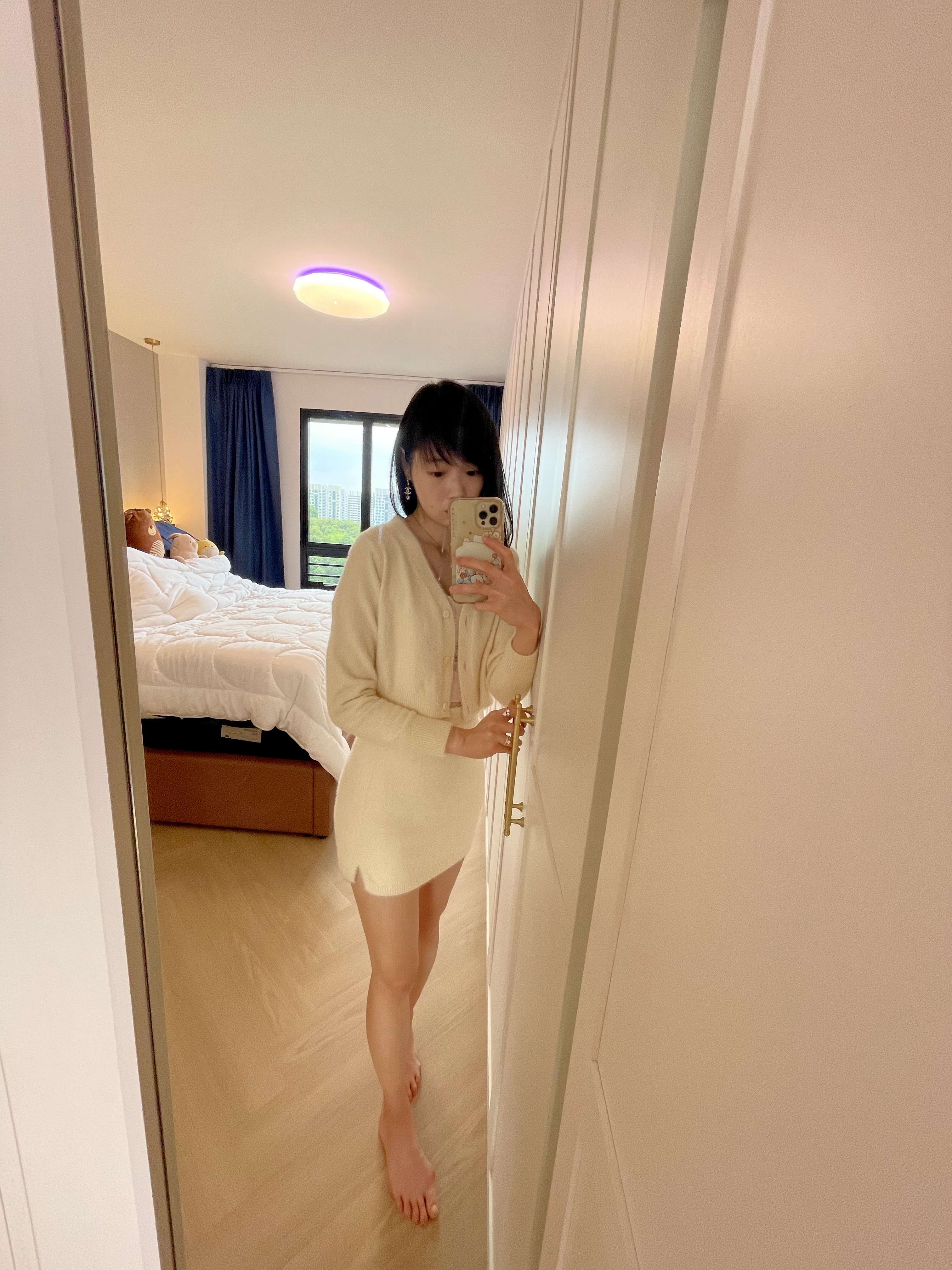 A Cosy Sanctuary: Our Slumber Haven With A Concealed Bathroom & Vanity - Mirror selfie, person taking photo, beige sweater