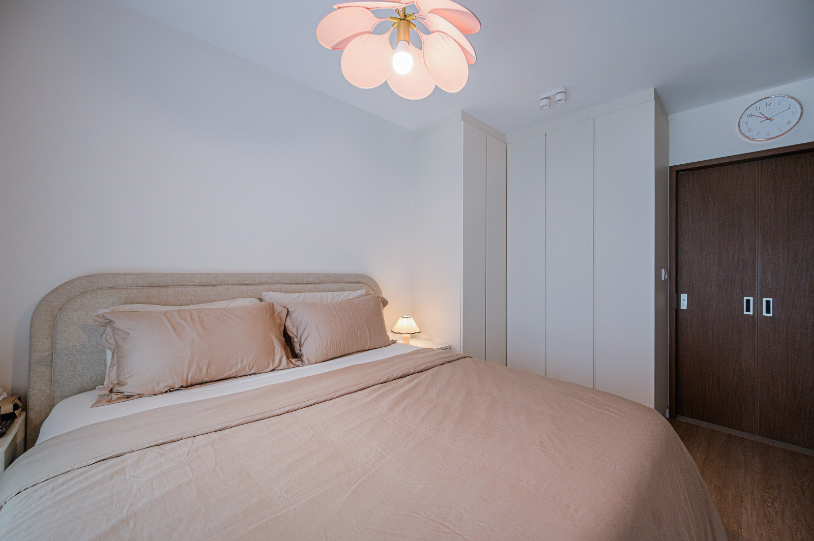 Calming Modern Bedroom in Creme Tones with DIY Wall Art - Soft beige bedding, modern headboard, elegant pendant light