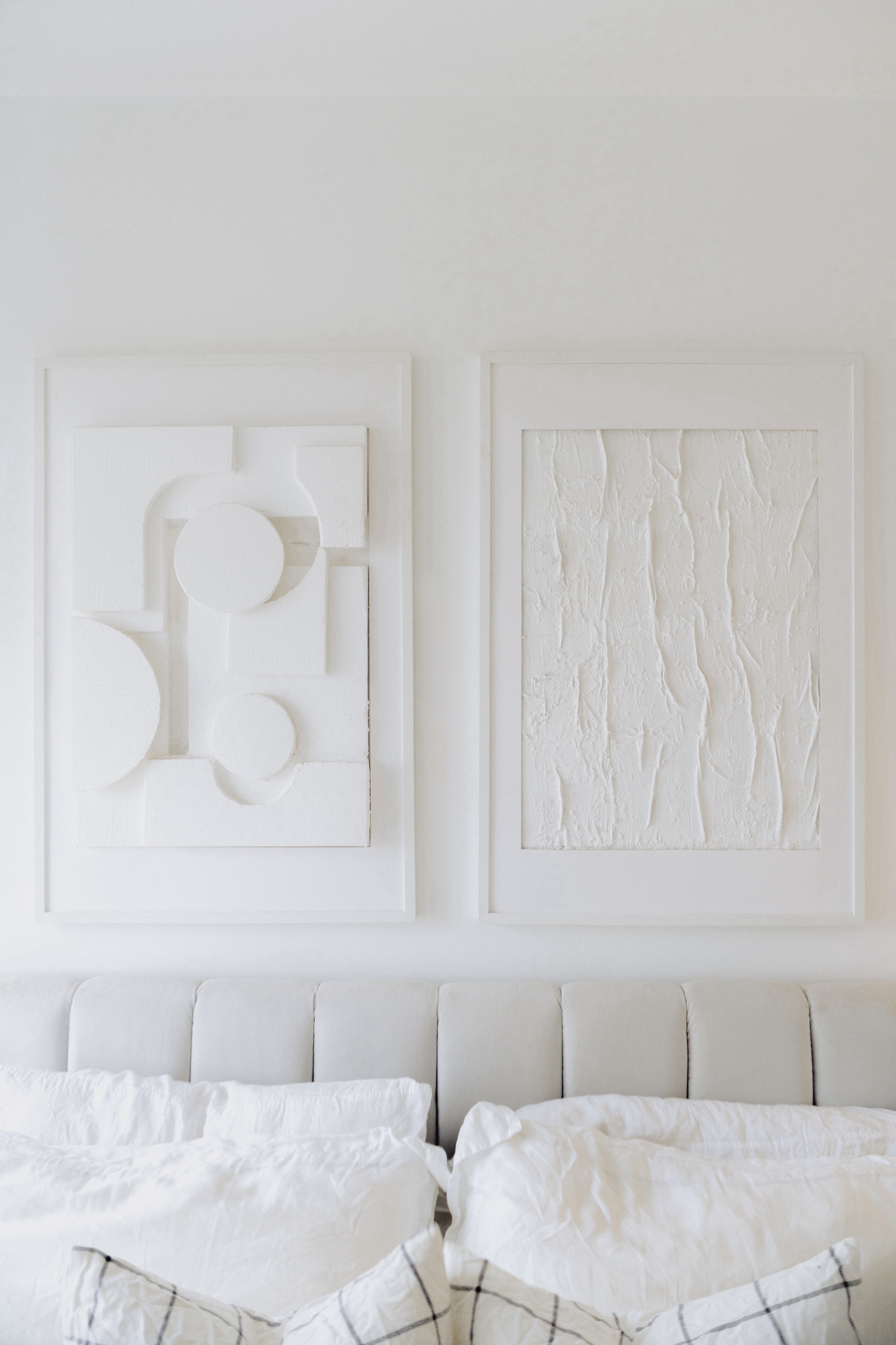 Our Bedroom: How We Changed It At Different Phases In Our Lives - White minimalist bedroom, modern art pieces, abstract