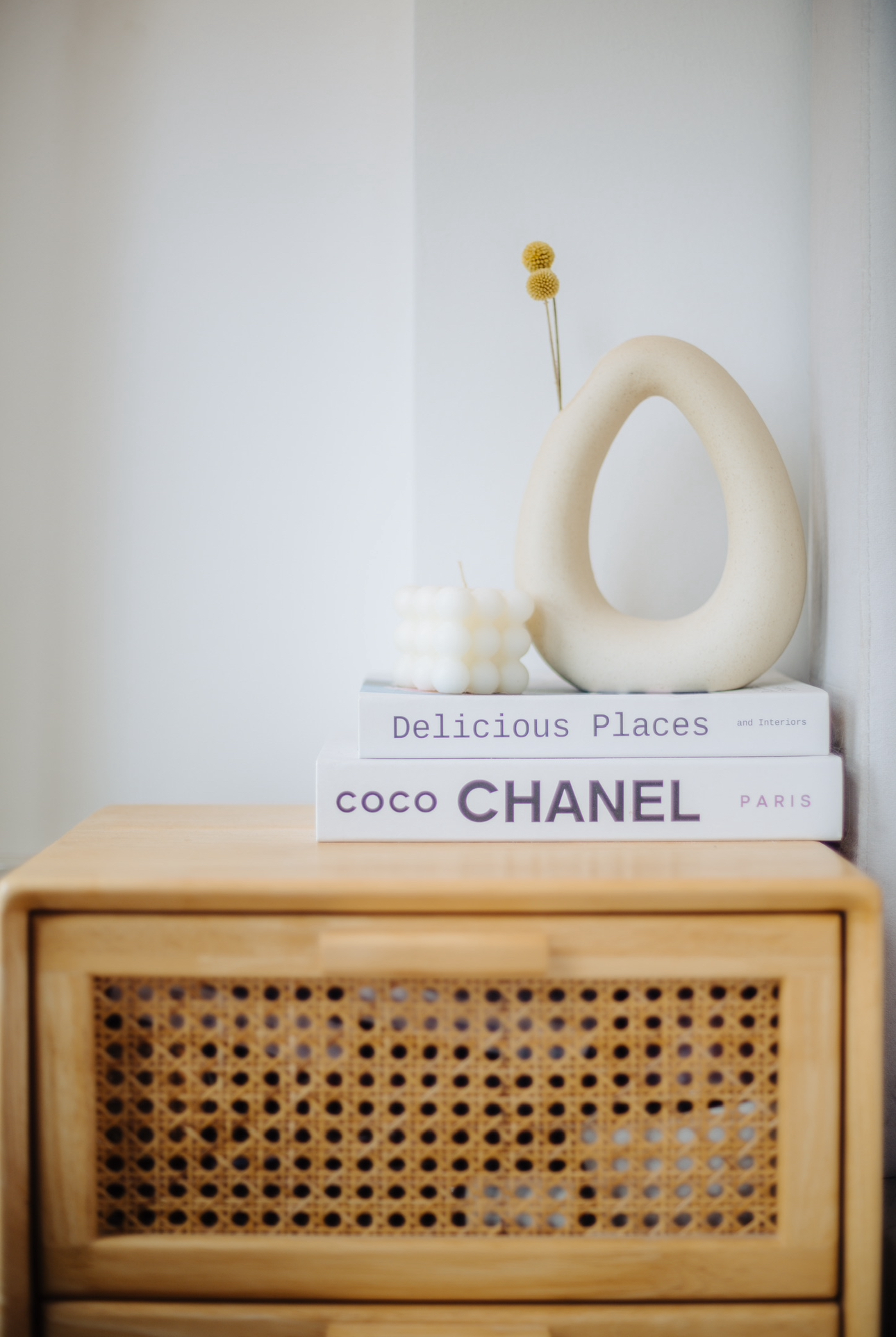 Our Bedroom: How We Changed It At Different Phases In Our Lives - White wall, minimalist decor, wooden shelf, soft lighting