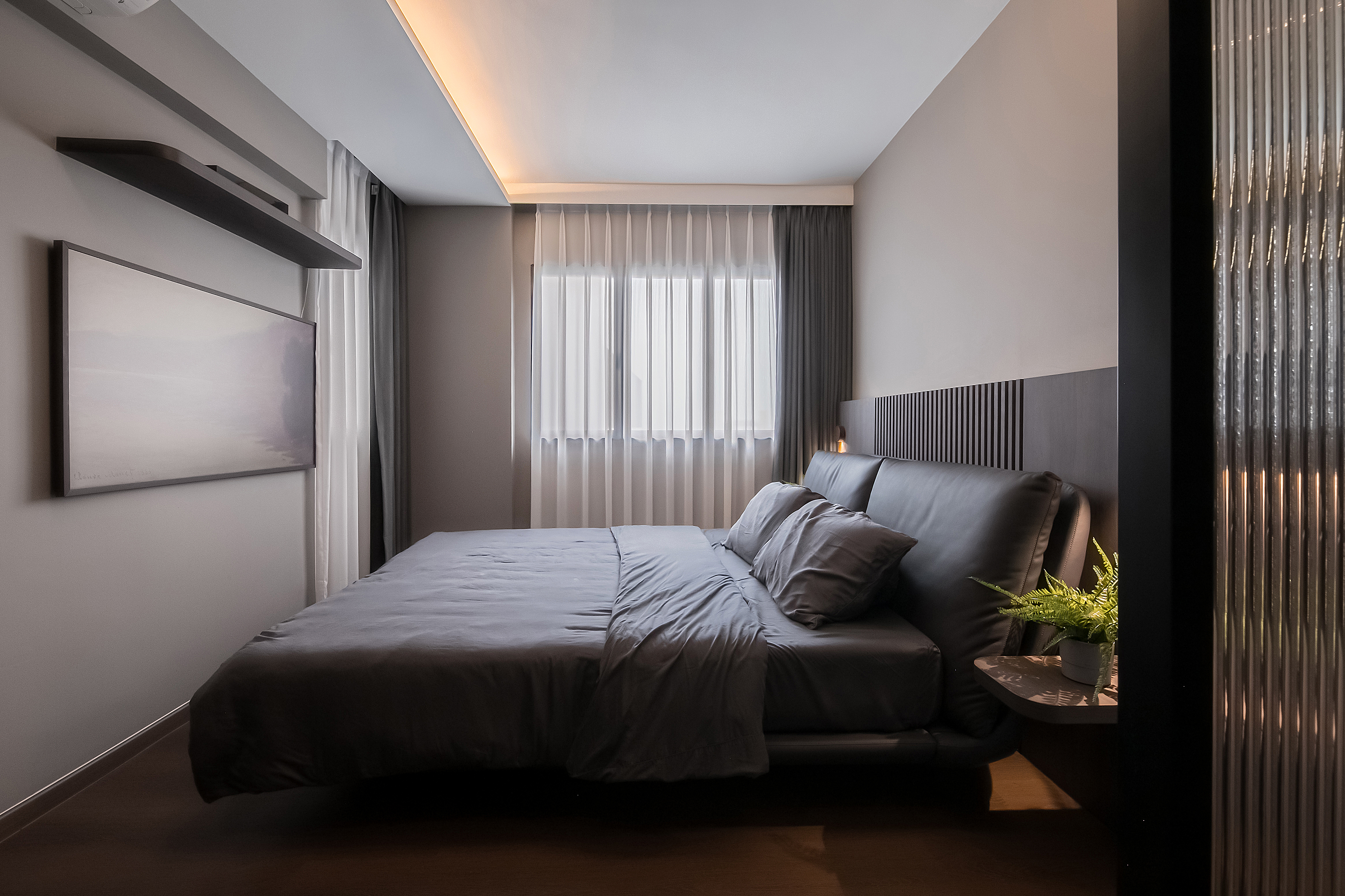 Hotel-inspired Bedroom: Daily Staycation! - Modern bedroom with sleek design, large bed with gray bedding, minimalist decor