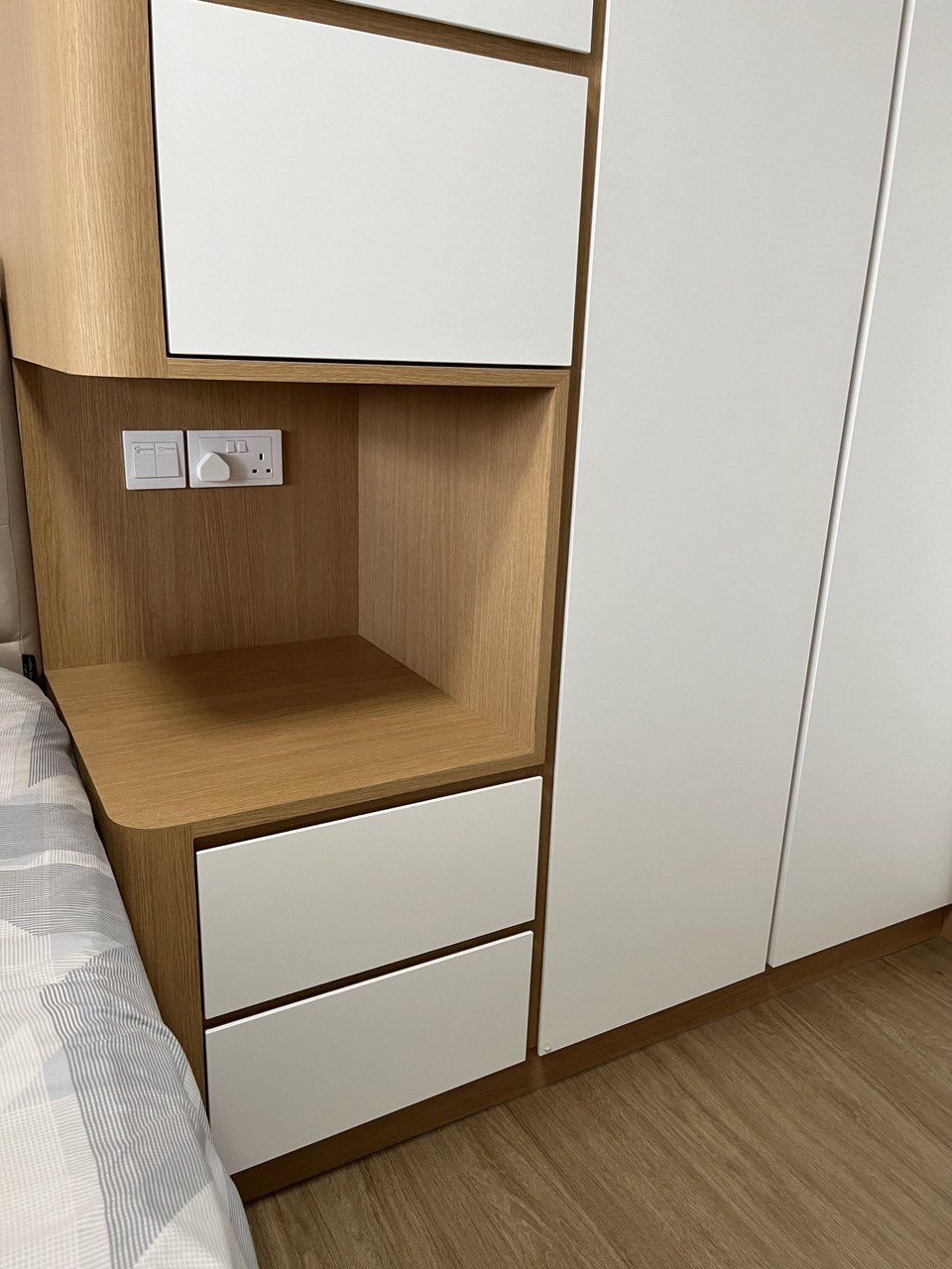 Cosy Japandi bedroom with a customised bedside cutout  - Wooden nightstand with built-in drawers, minimalist design