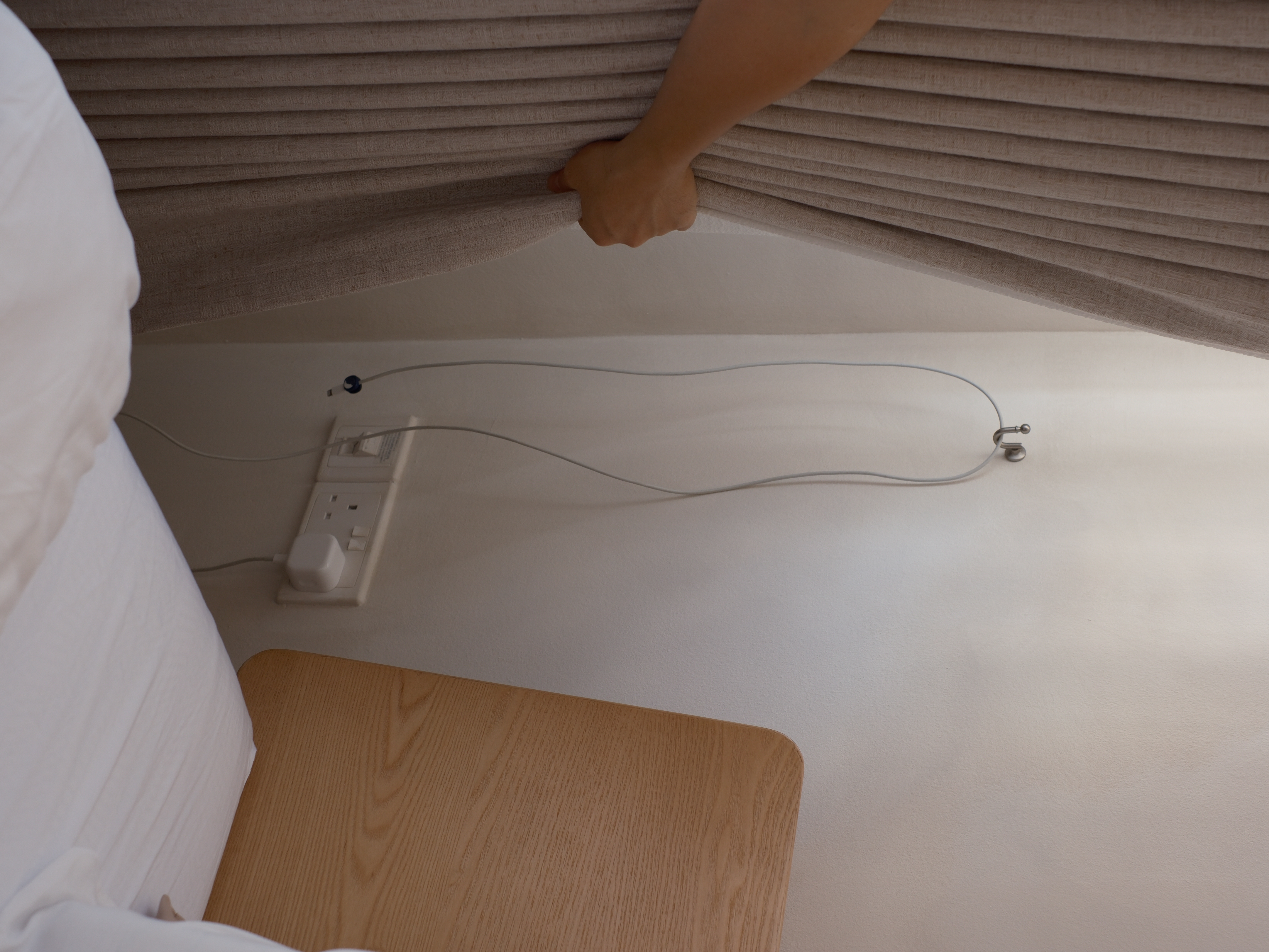 Our Bedroom: It's All About the Mood - curtain, bedding, room corner, ceiling fan, electrical outlet, power cord, wall