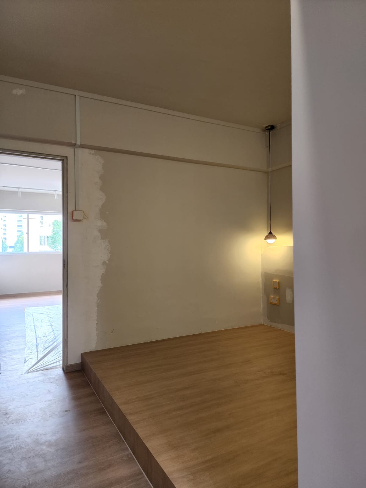 We spent $72k on our 4-Room HDB Renovation Journey - unfinished walls, bare floor, room under renovation, light switch