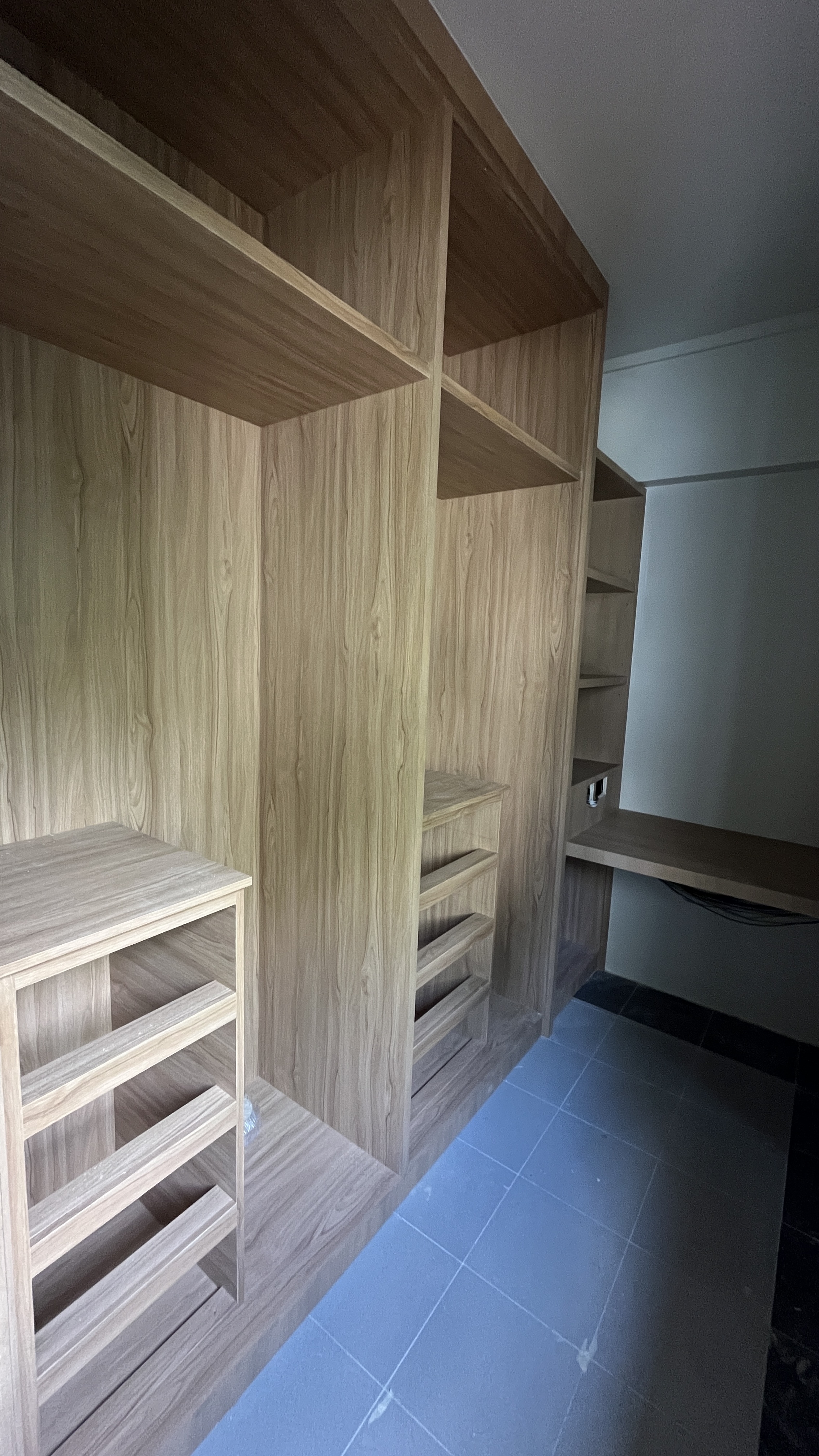 We spent $72k on our 4-Room HDB Renovation Journey - Wooden shelving unit, minimalist design, light wood finish, built-in