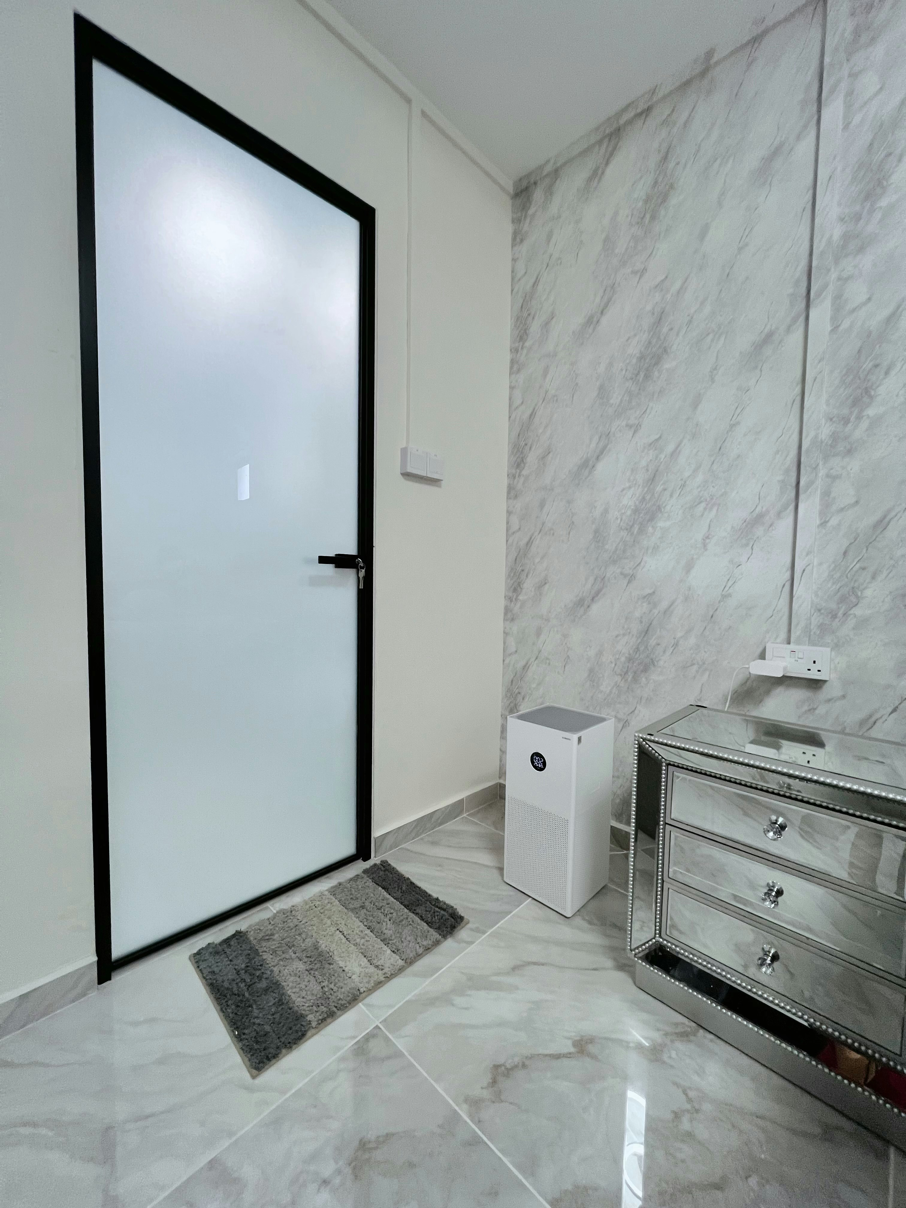 The Master Bedroom: Peaceful nights and bright mornings start here!  - Glass door, marble wall, white door frame, gray rug