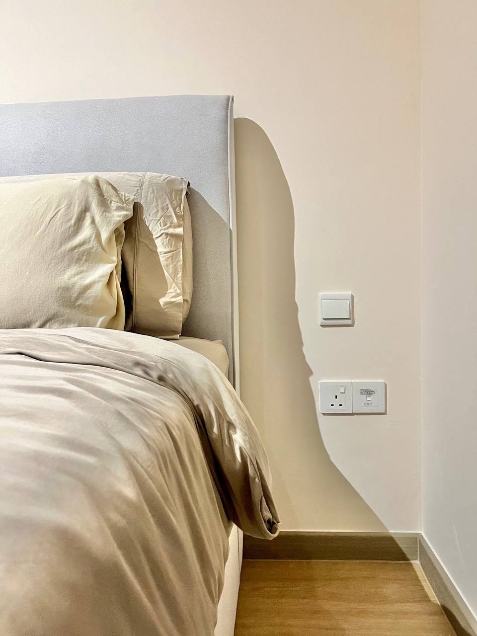 Master Bedroom: Going Basic with a Near Monochromatic Look - Light beige bed with soft, flowing bedding, beige pillows and