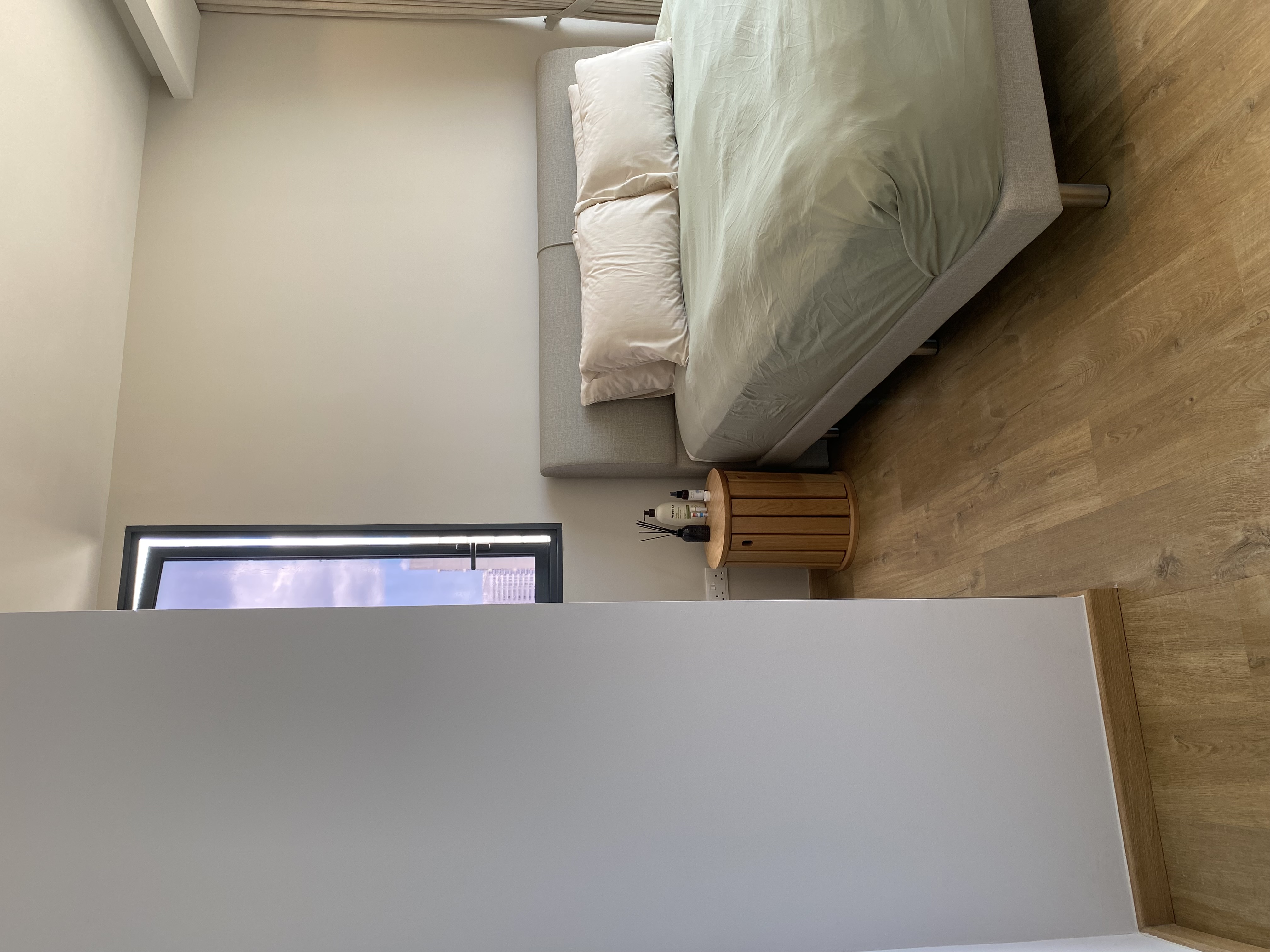 Our master bedroom with only a king sized bed and built-in wardrobe - Modern minimalist bedroom, neutral color palette, light