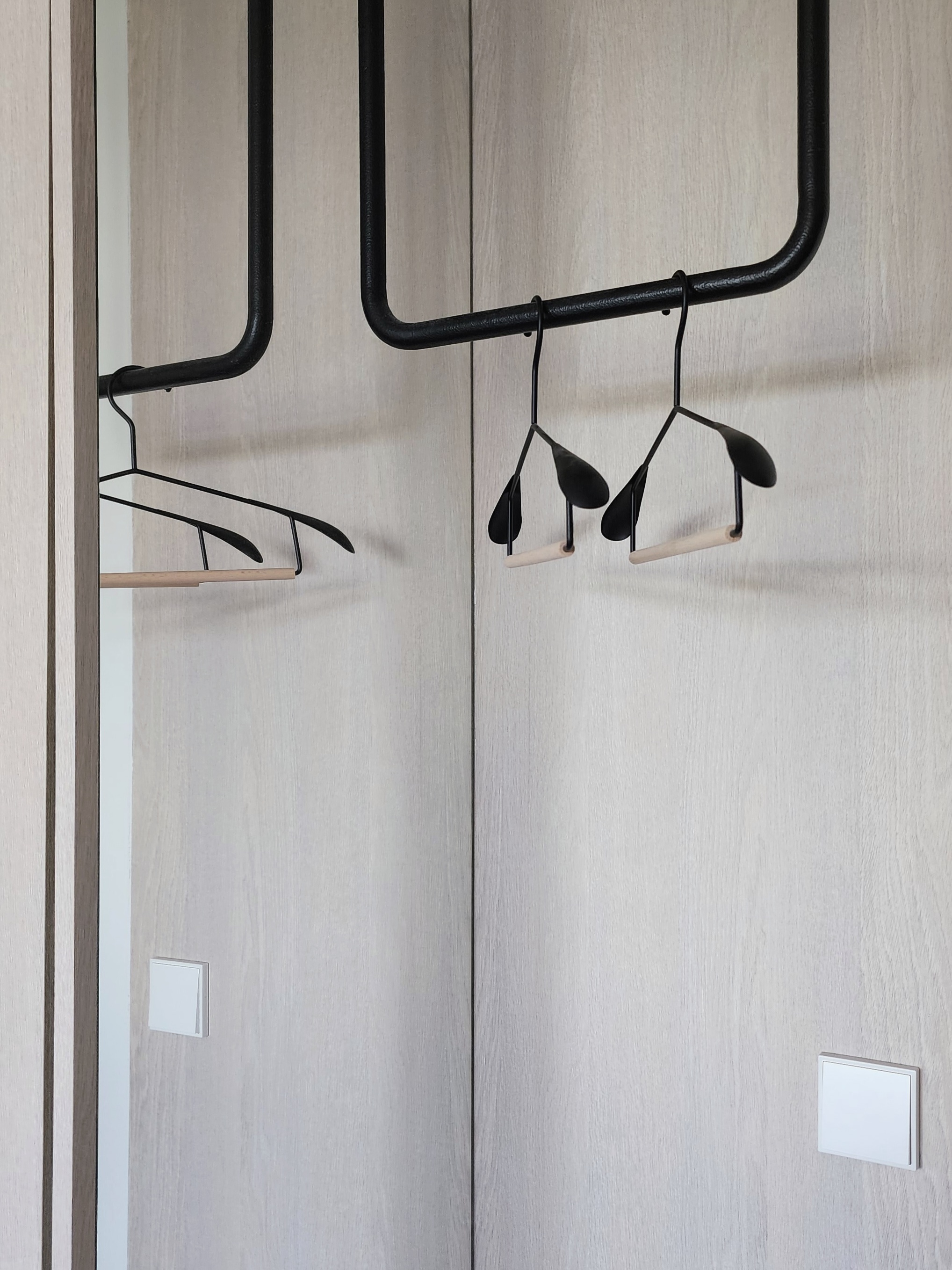 Our Bedroom: We Customised An XL Bed For The Family!  - modern closet, minimalist design, black metal hangers, floating