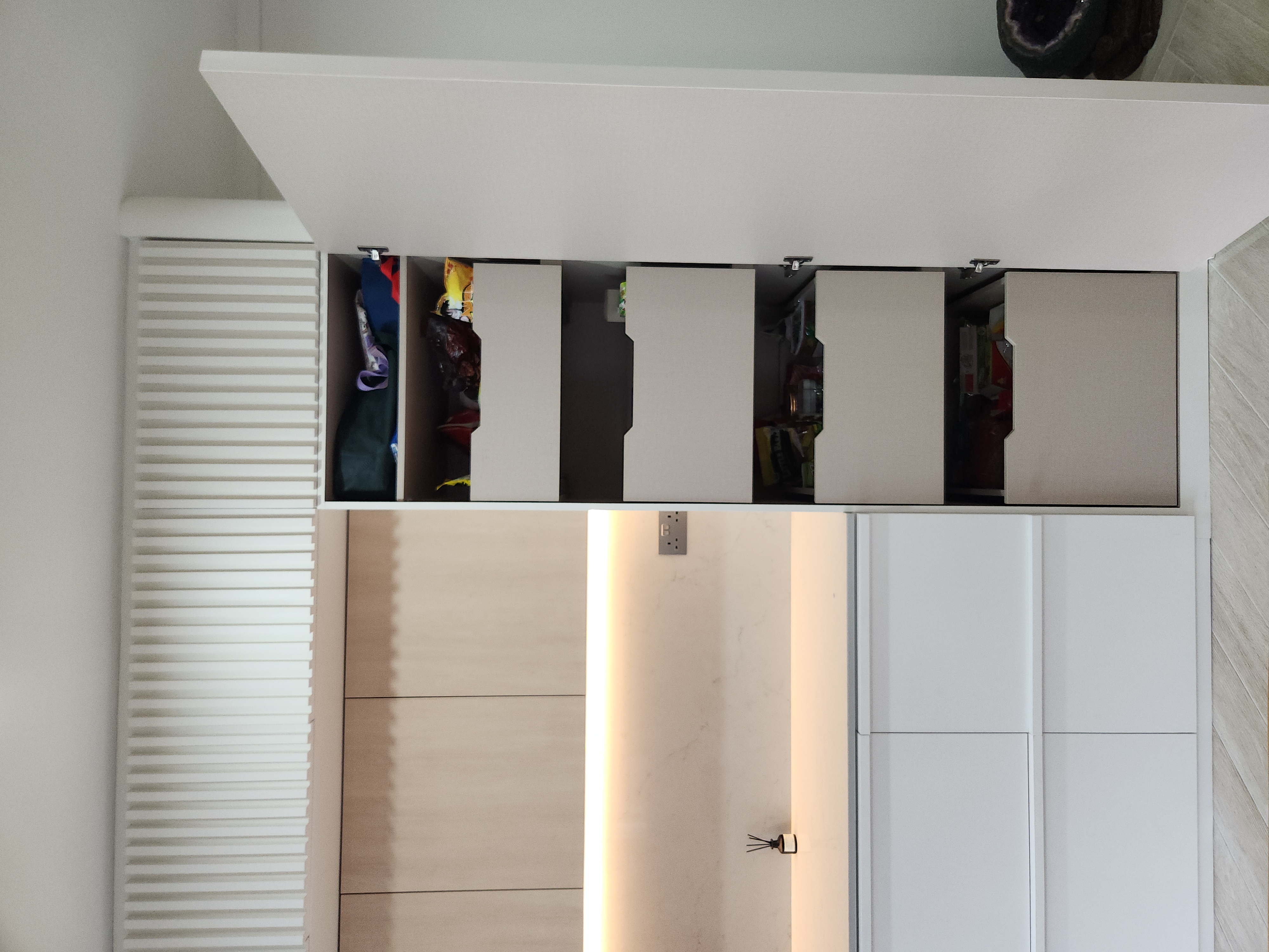 Spent 4k to Reconnect? - Modern minimalist wardrobe with open doors, neatly organized clothes, white cabinets with integrated