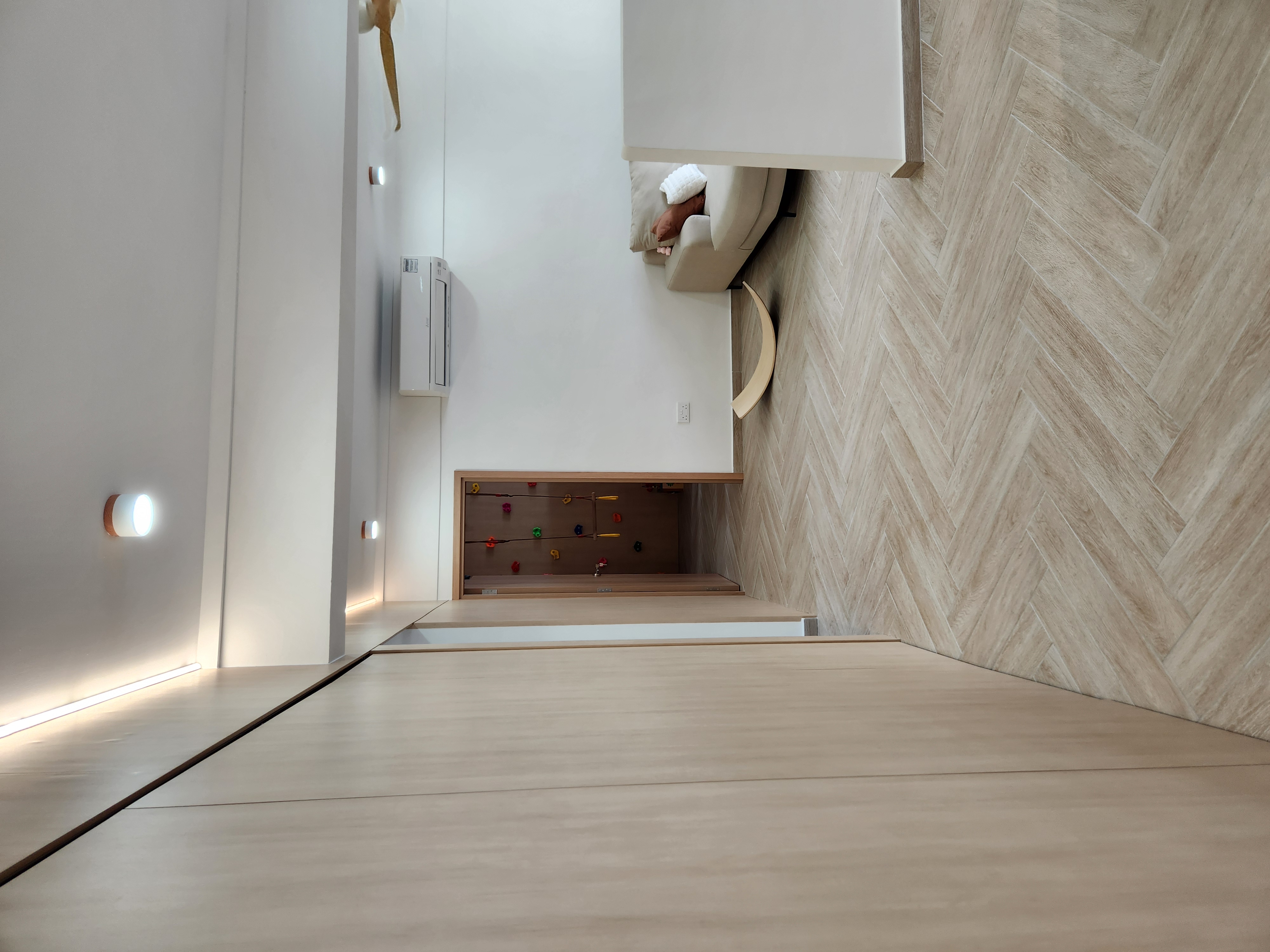 Spent 4k to Reconnect? - Modern minimalist interior, sleek white wall, recessed lighting, wooden floor, herringbone pattern