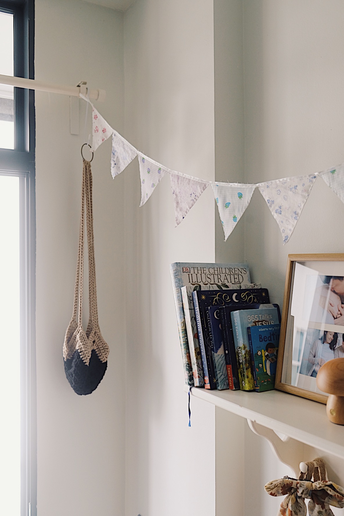 Our bedroom with a kitchenette: Transformation from 2 to 2+1 to 3-in-1 - Bunting, window, hanging, bookshelf, books, framed