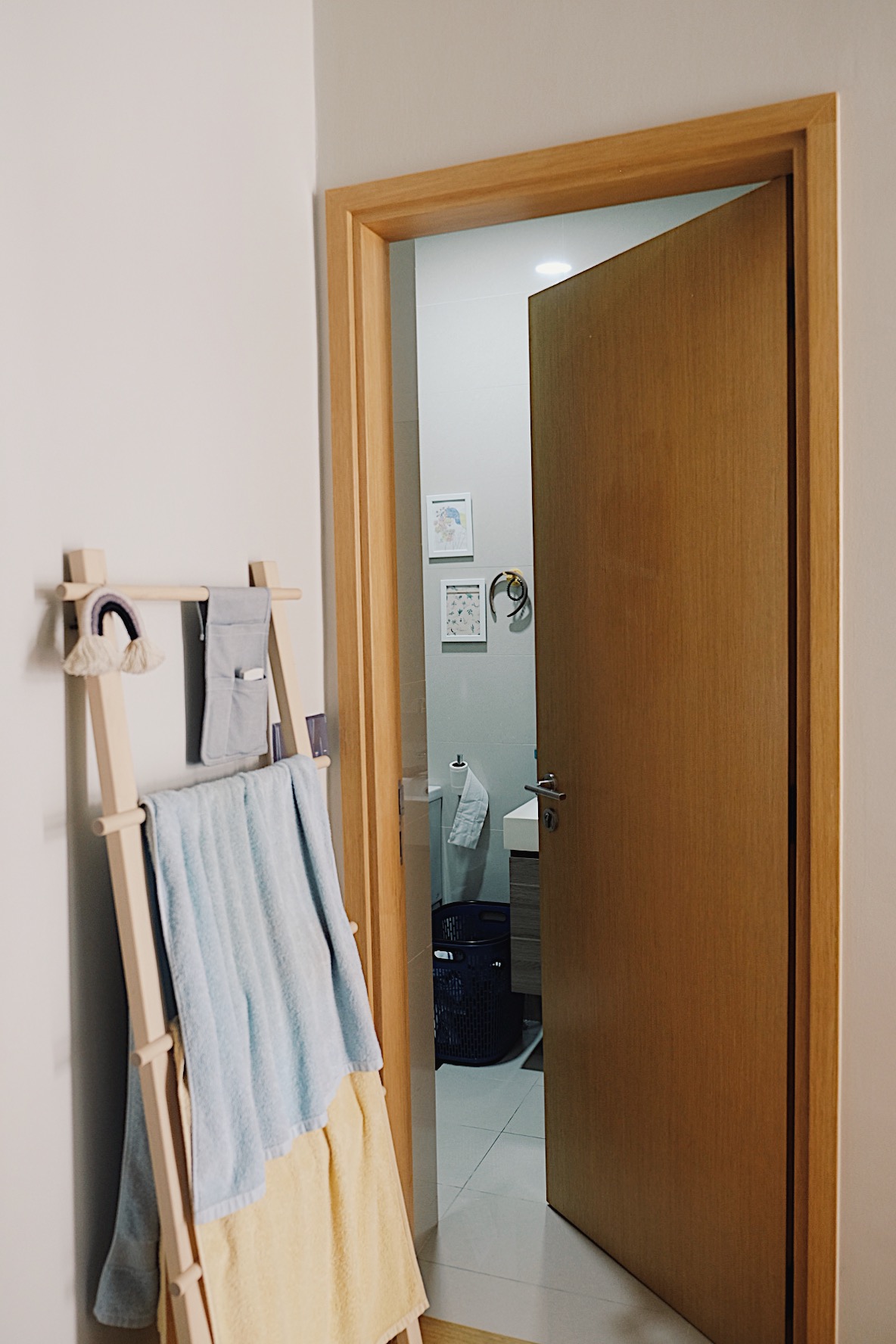 Our bedroom with a kitchenette: Transformation from 2 to 2+1 to 3-in-1 - Light blue towels, wooden drying rack, neatly hung
