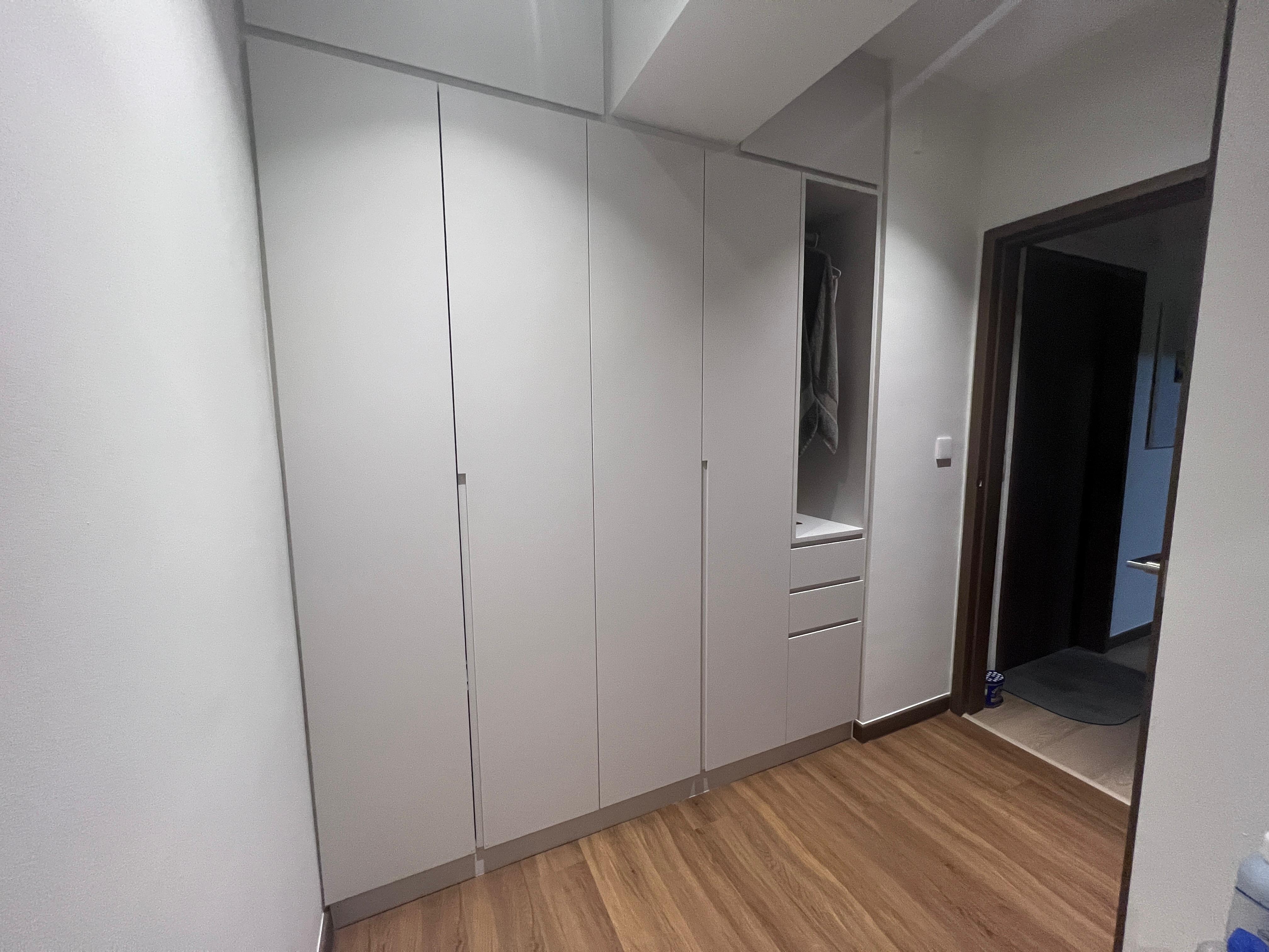 Serenity in our bedroom. - White modern wardrobe with sliding doors, minimalist design, wooden floor, sleek cabinets, open