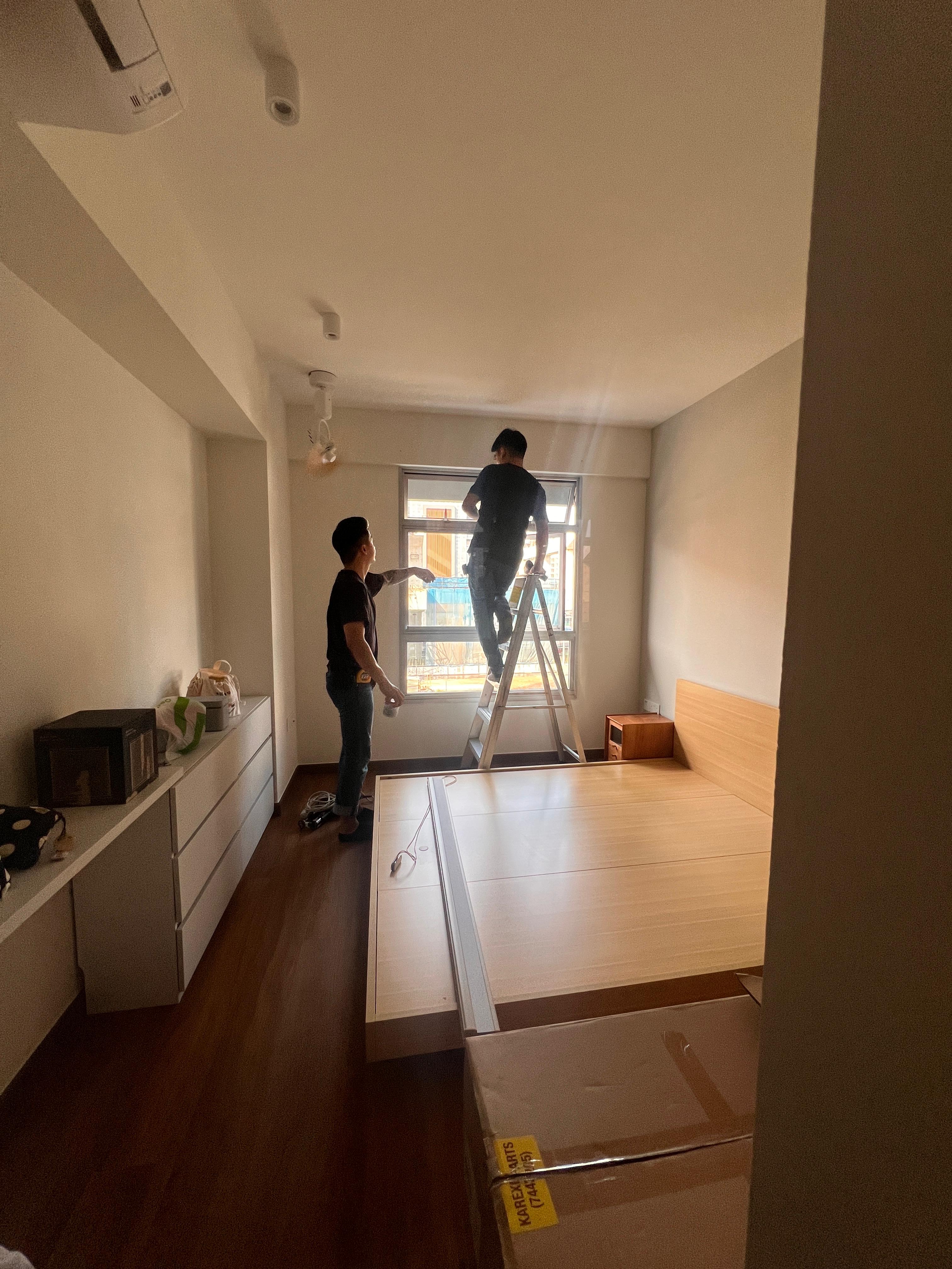 Serenity in our bedroom. - Two individuals working on a room renovation project, Interior space with modern furniture and