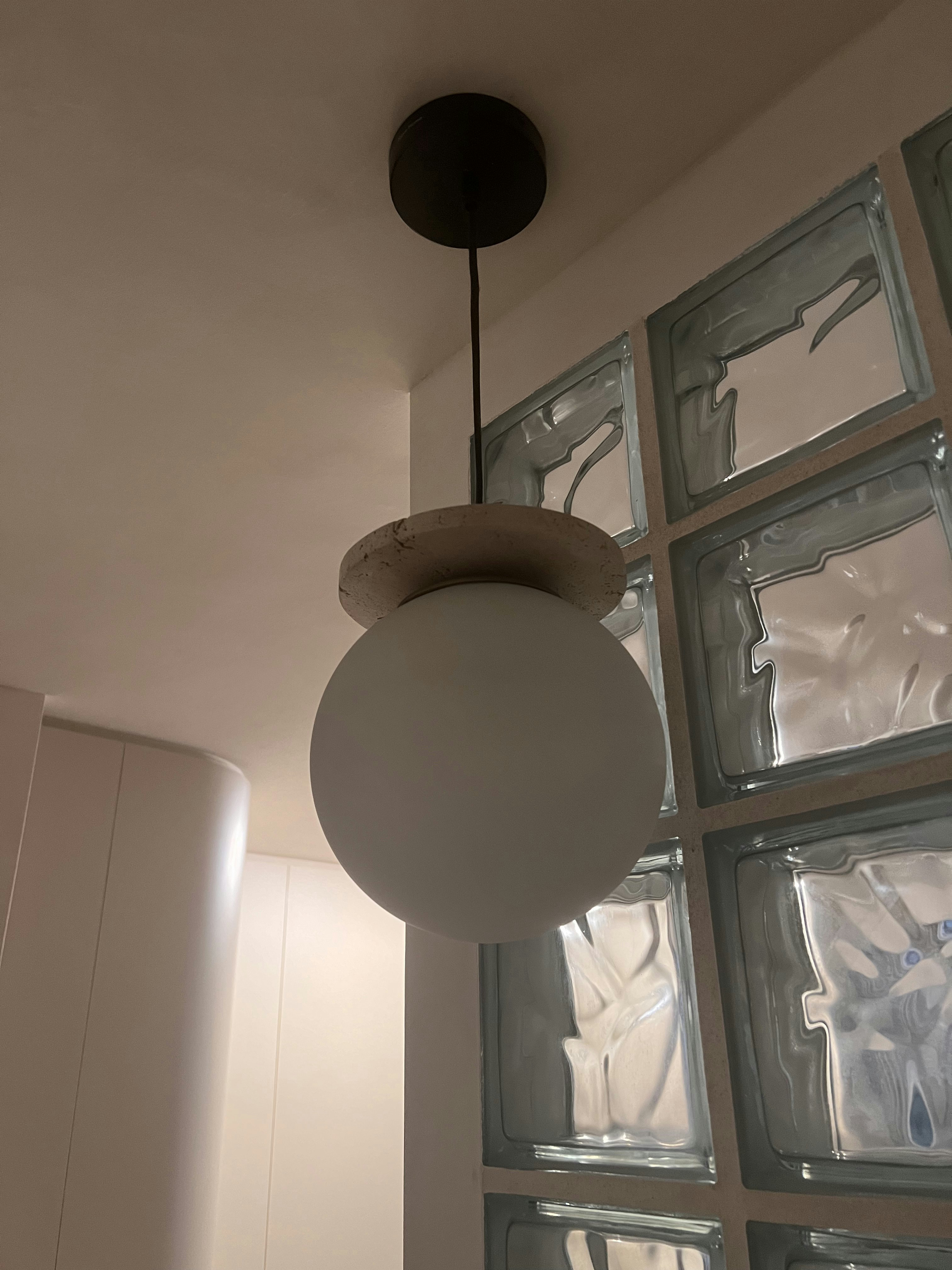 Is it a good idea to bring your vanity out of your toilet?  - Modern pendant light fixture, minimalist design, round white