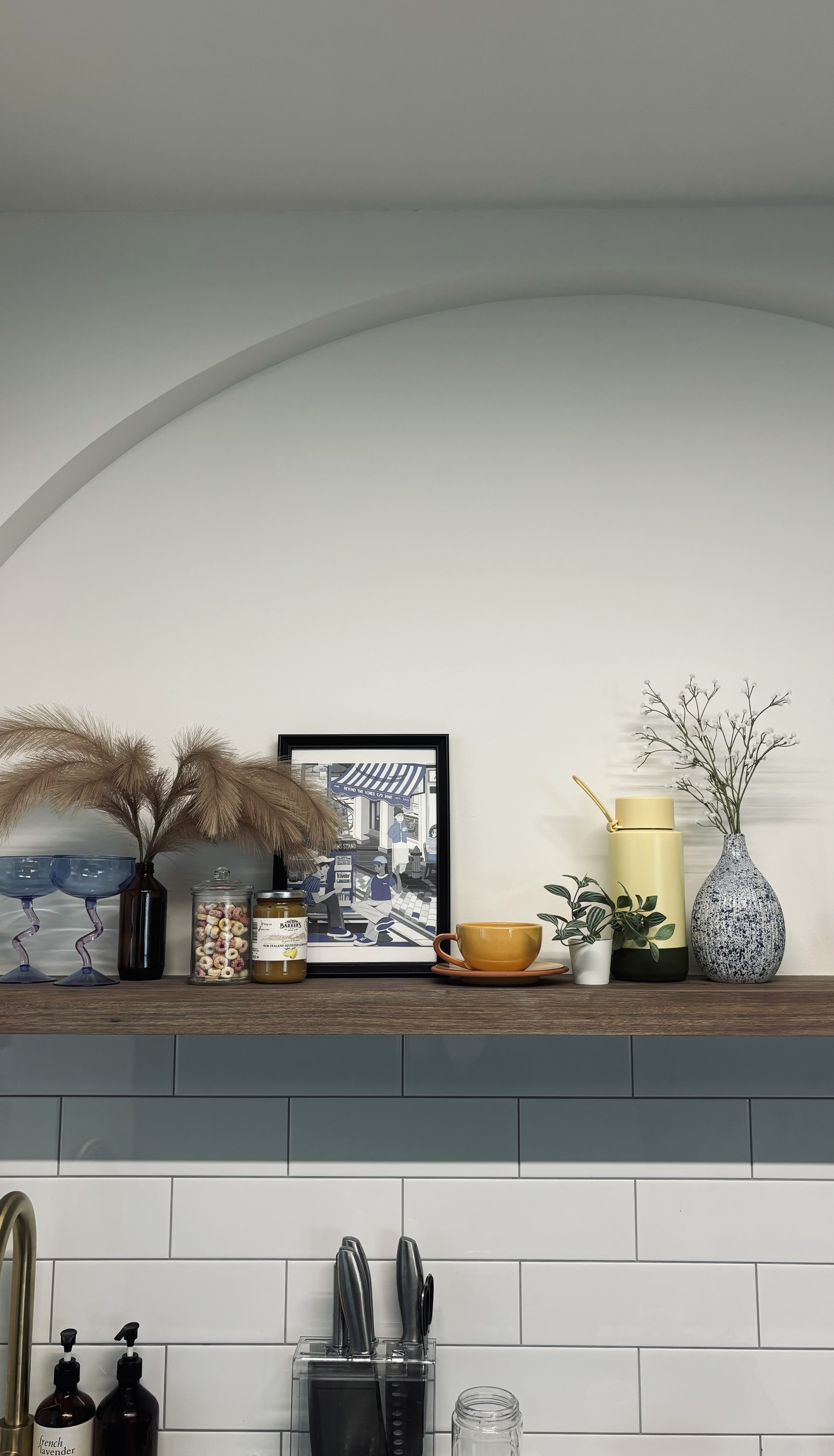 Home decor ideas - we change them from time to time! - vintage framed picture, blue goblets, pampas grass, ceramic jars