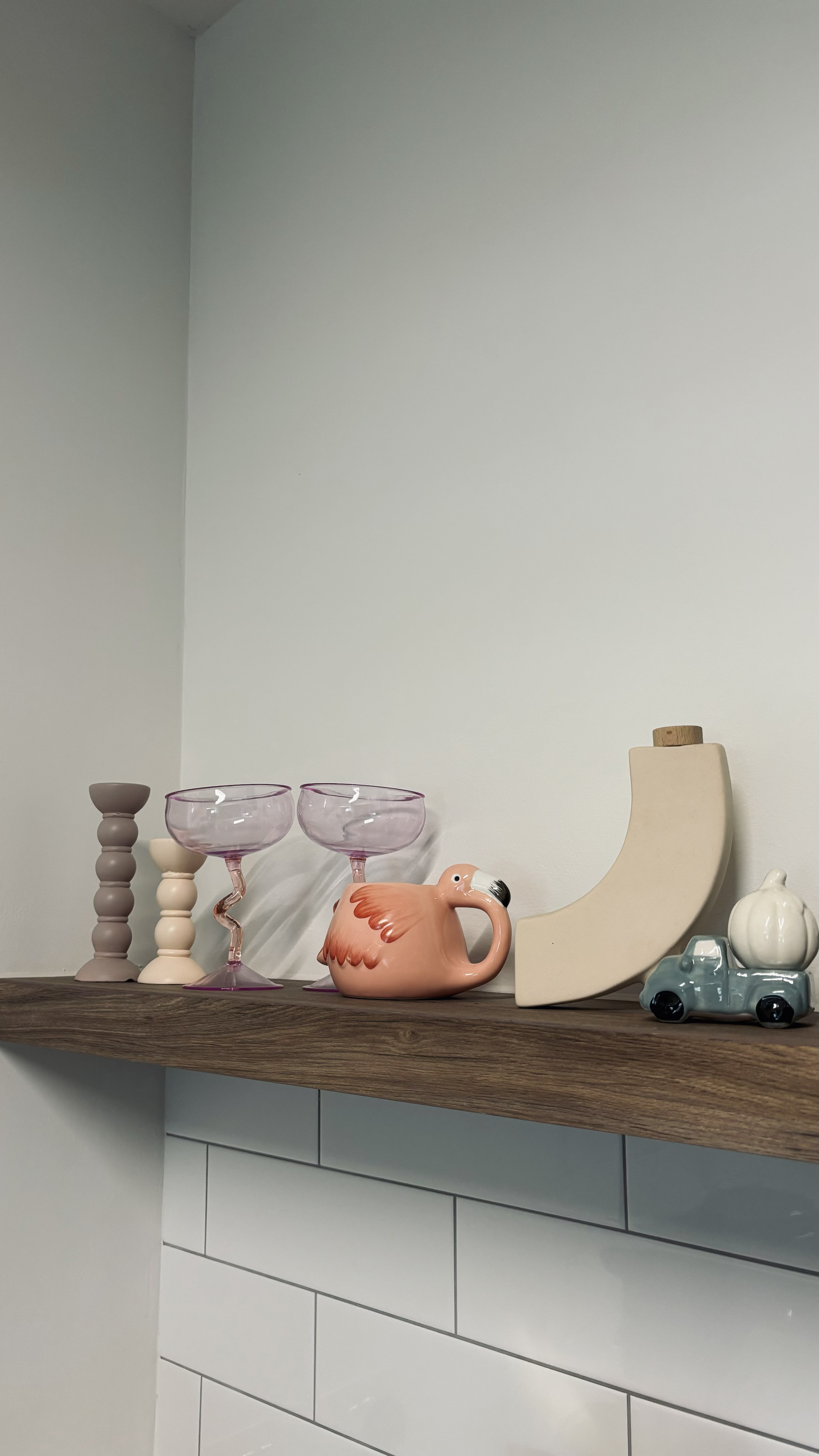 Home decor ideas - we change them from time to time! - vintage glass goblets, wooden shelf, abstract art, whimsical flamingo