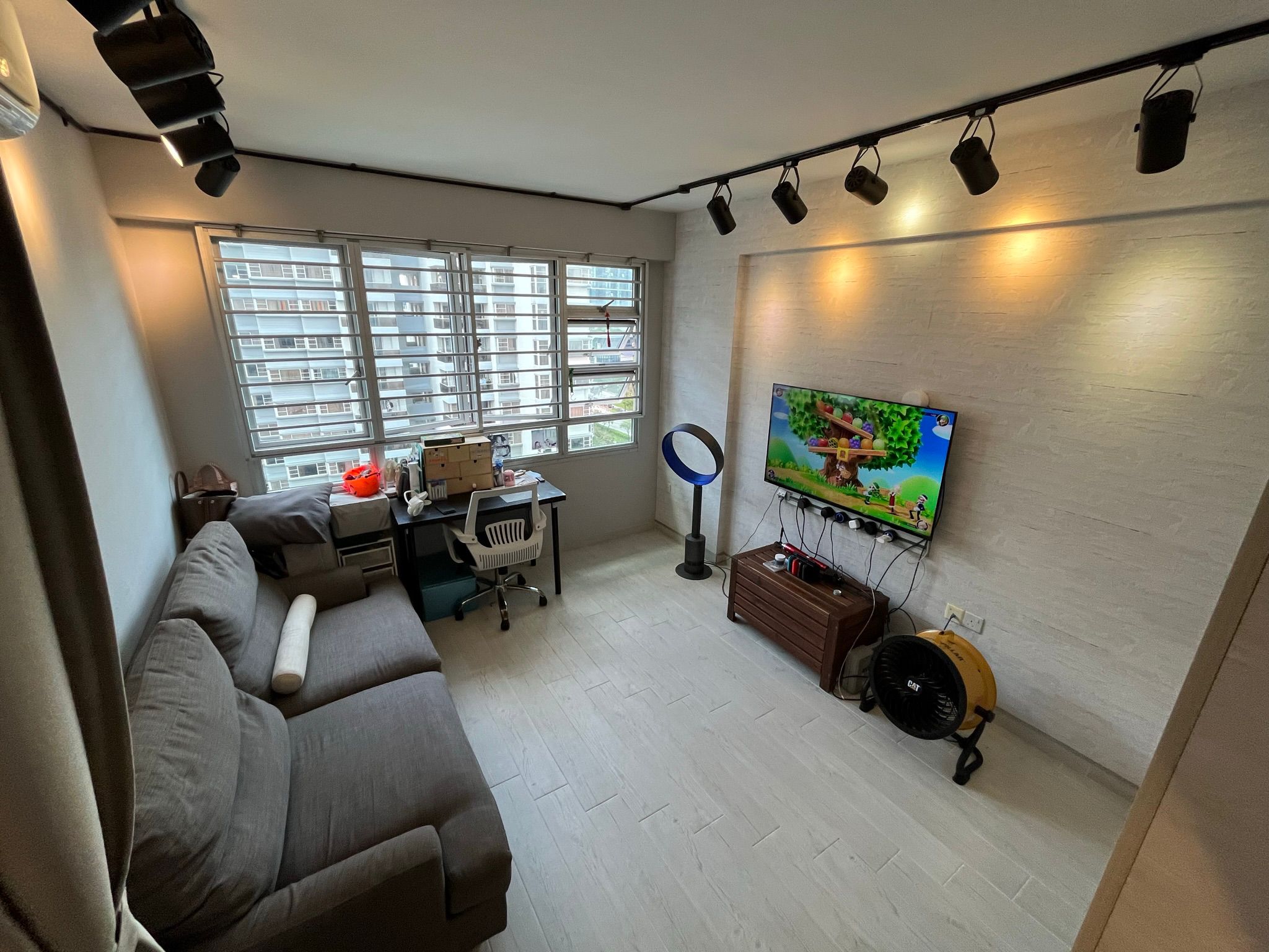 Transforming Our Living Room : Minimalist and Smart Storage Solution - Modern living room with comfortable gray sofa, large