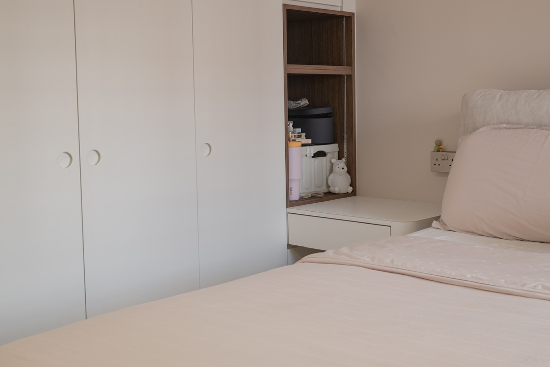 Maximising space in our compact master bedroom  - White wardrobe with round knobs, beige bed with soft bedding, small white