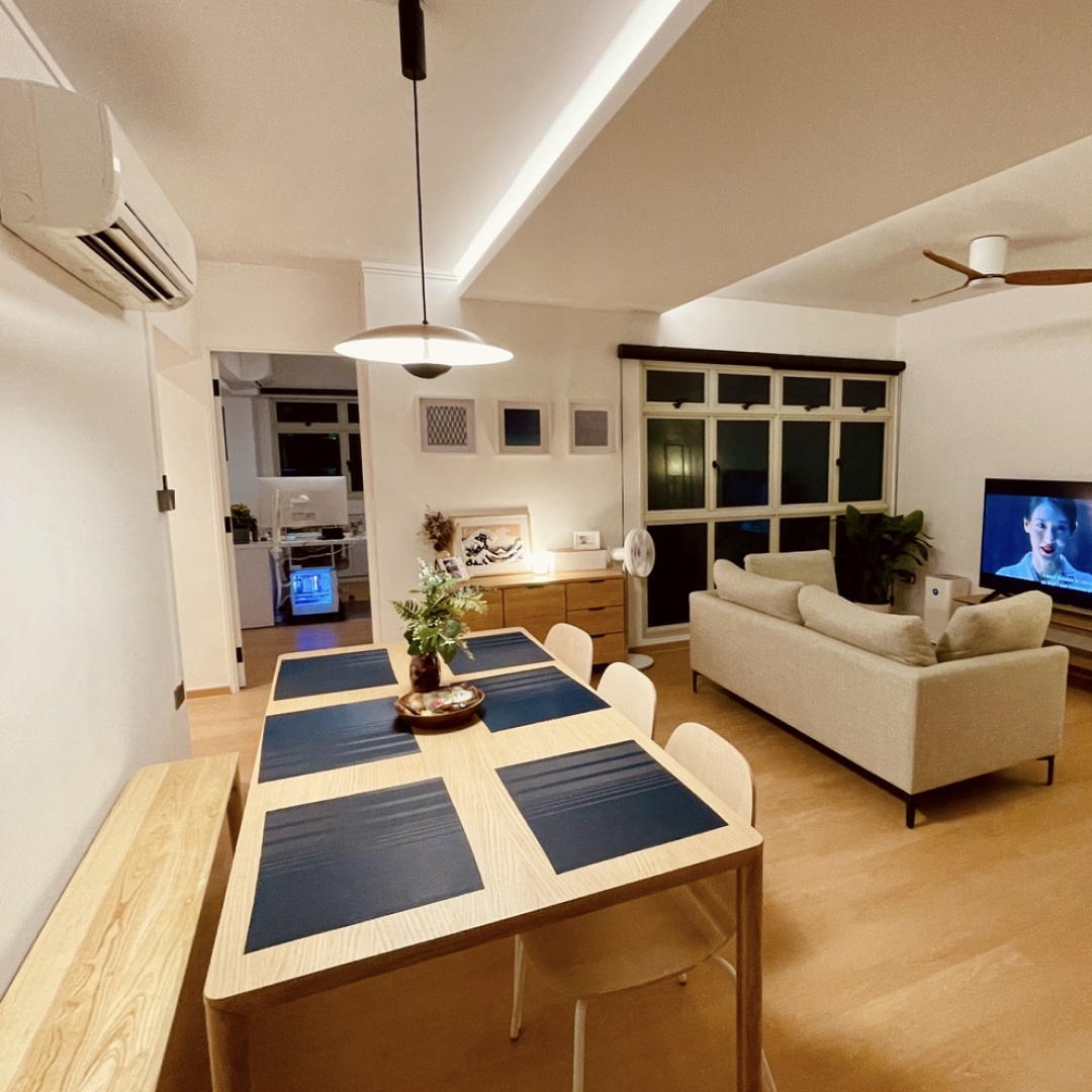 42k Reno for a 4 room resale flat in Punggol  - Wooden dining table with blue placemats, modern living room, minimalist