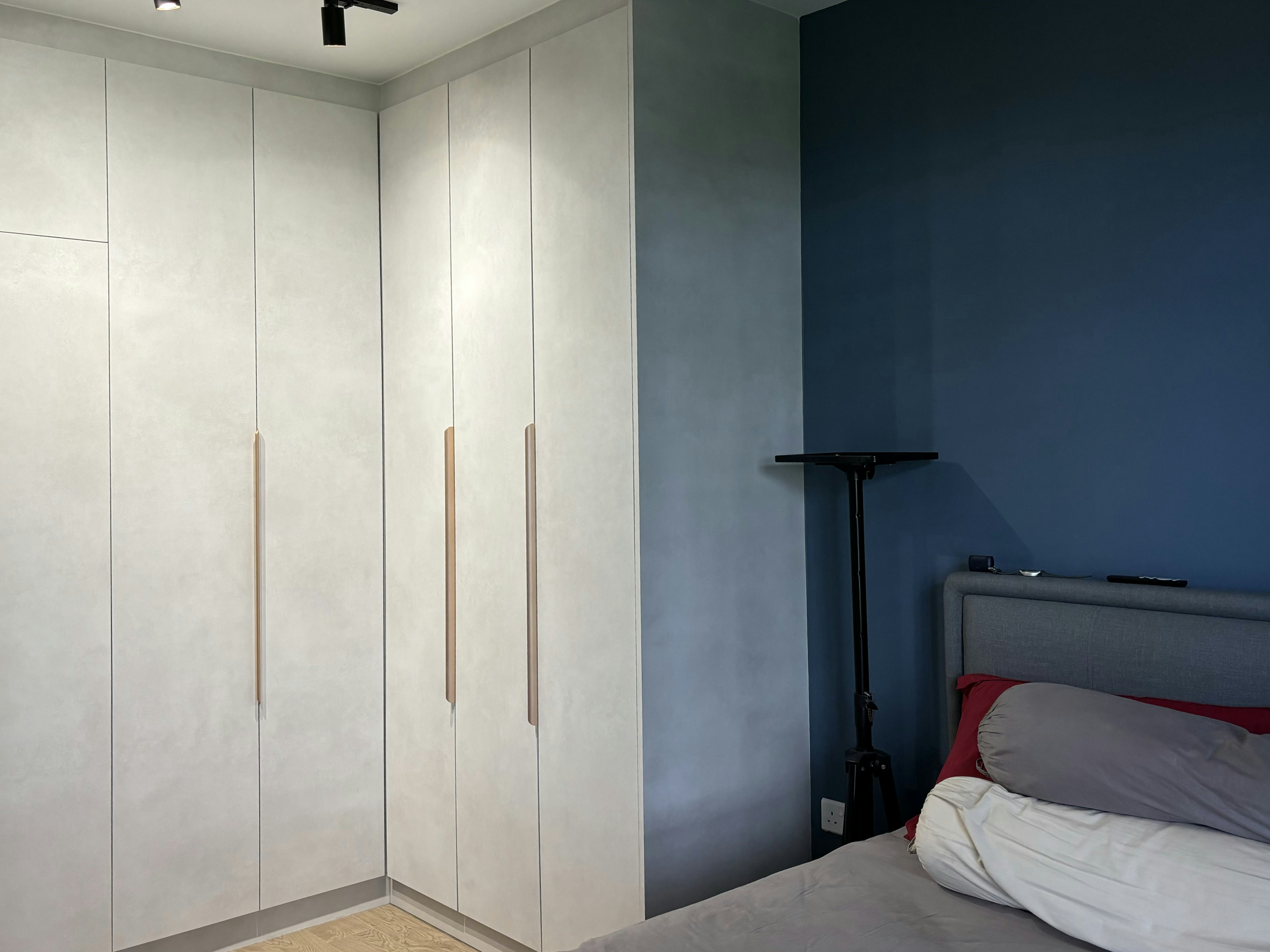 Master Bedroom: A practical, cosy haven - Light gray cabinets with gold handles, minimalist design, modern aesthetic, sleek