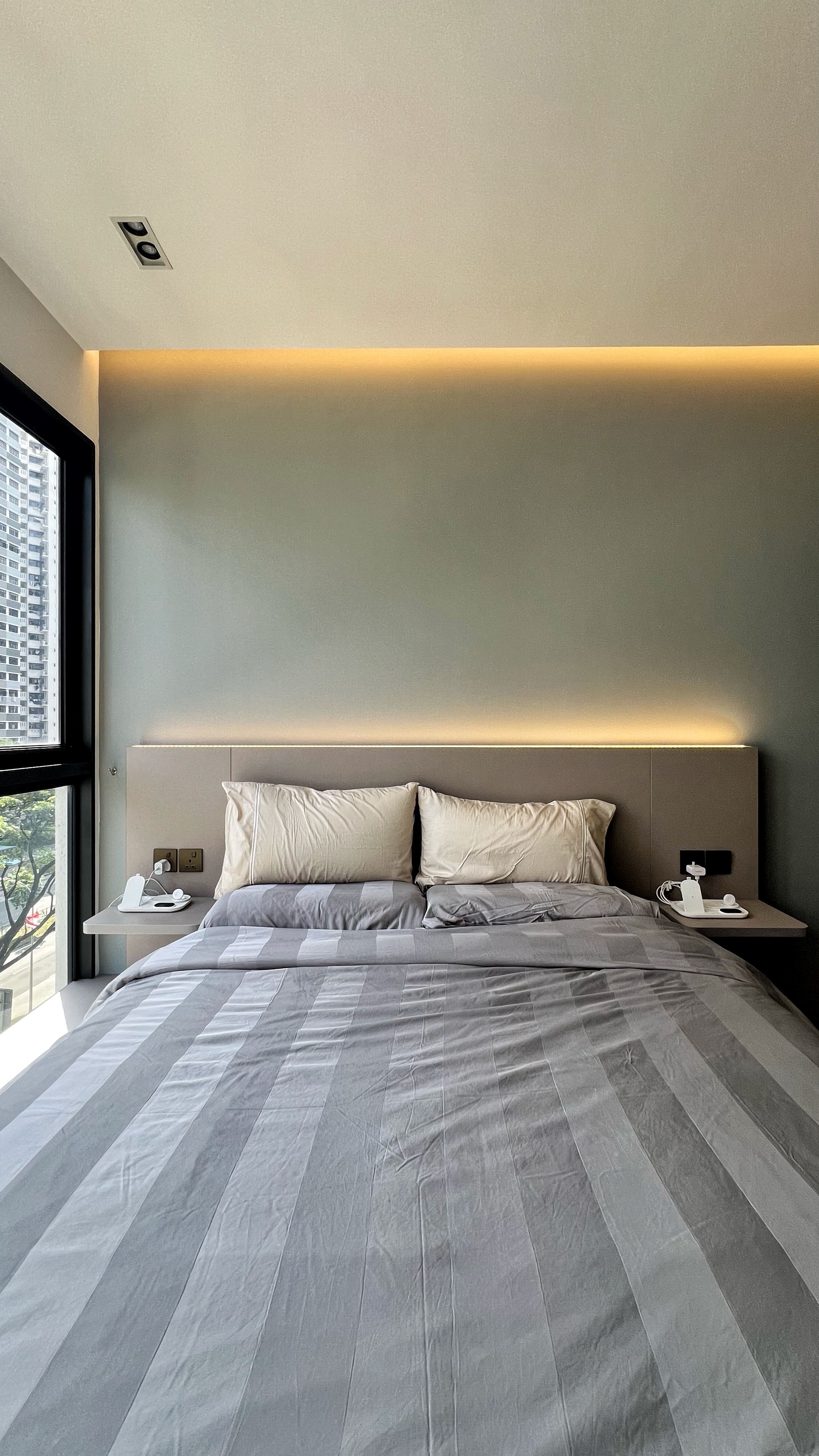 Unwind and Recharge: A Minimalist Yet Cosy Bedroom Retreat - Modern minimalist bedroom, neutral color palette, large bed with