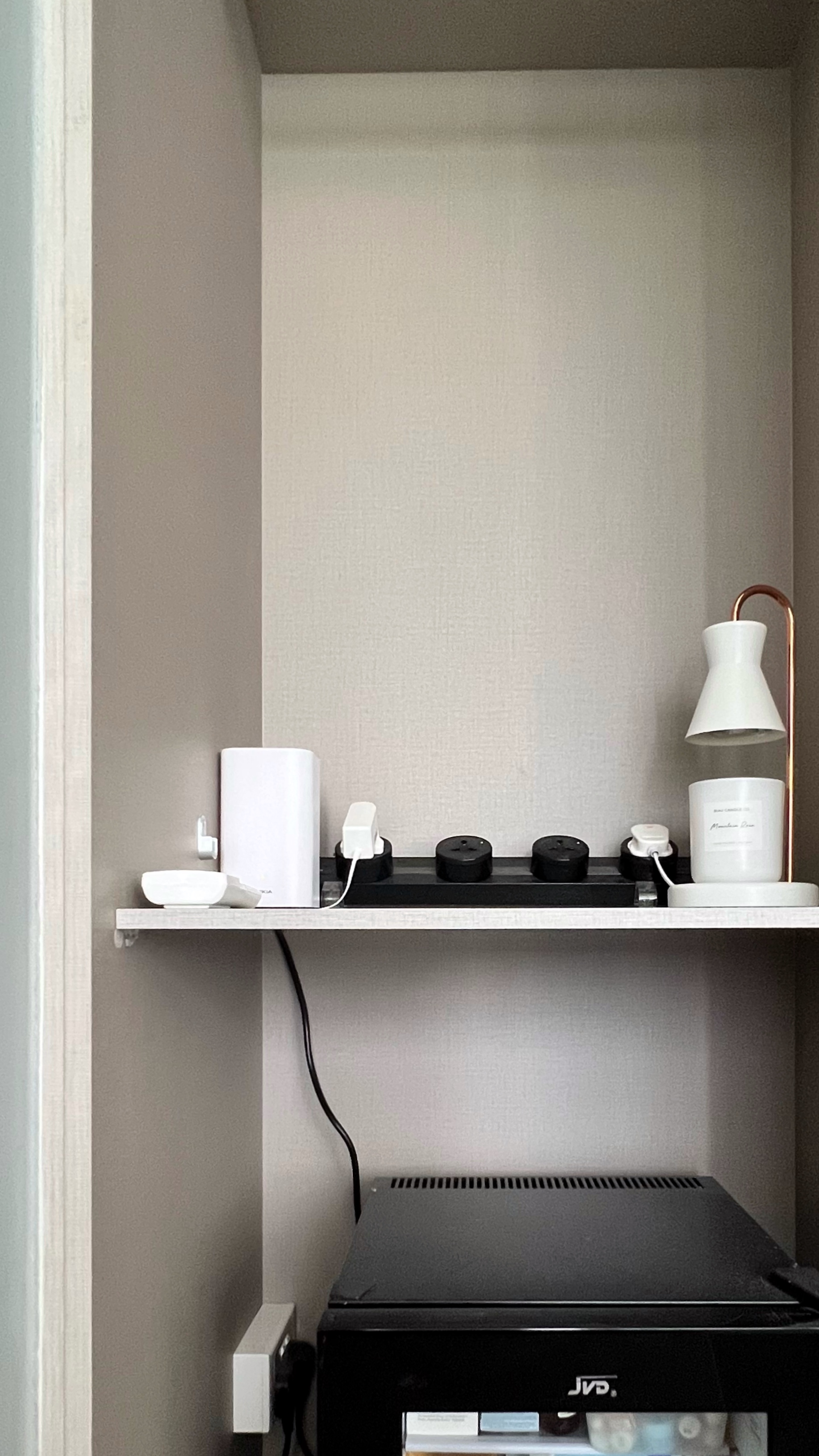 Unwind and Recharge: A Minimalist Yet Cosy Bedroom Retreat - smart home setup, wireless charging station, charging station