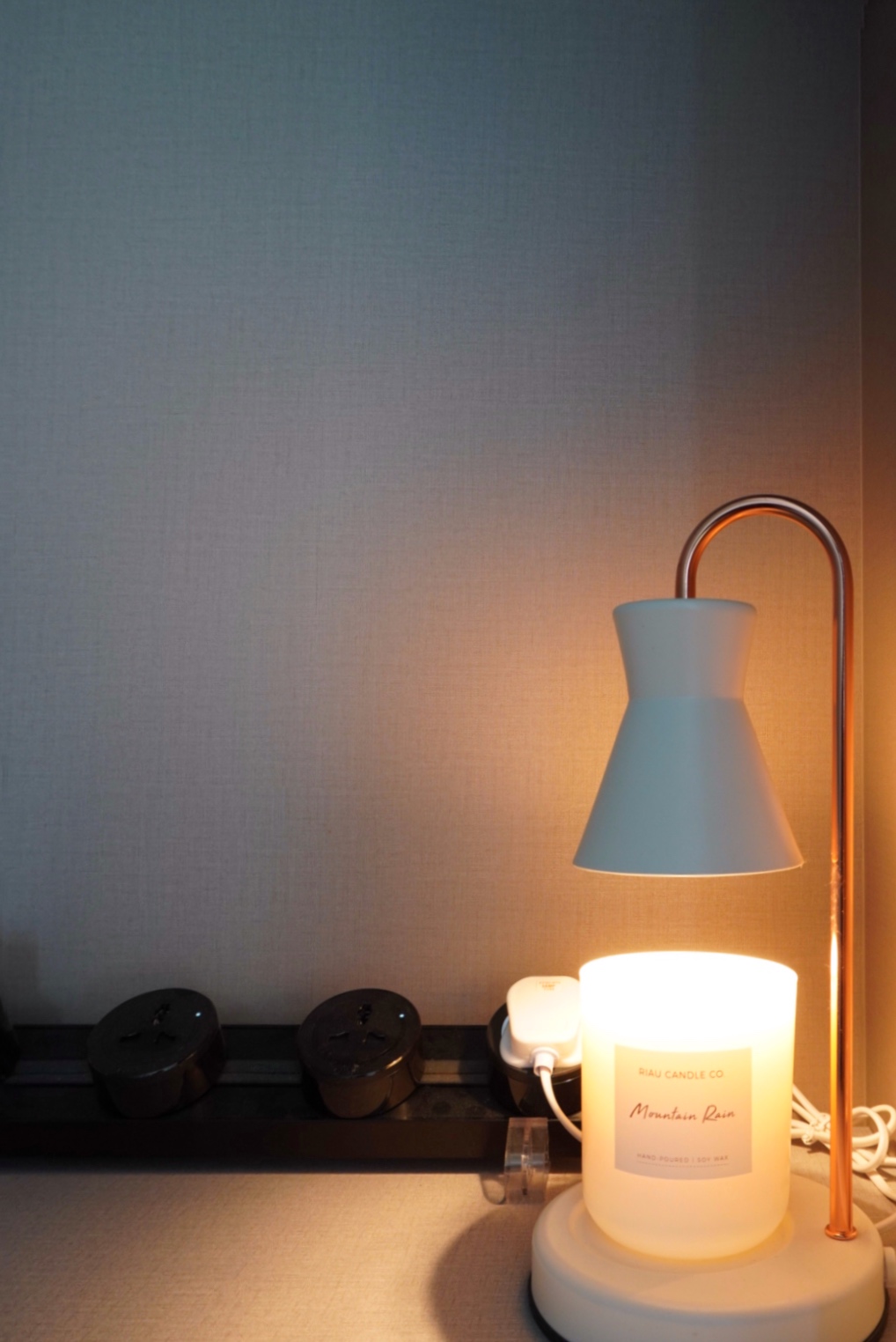 Unwind and Recharge: A Minimalist Yet Cosy Bedroom Retreat - Candle stand, modern decor, minimalist design, soft lighting