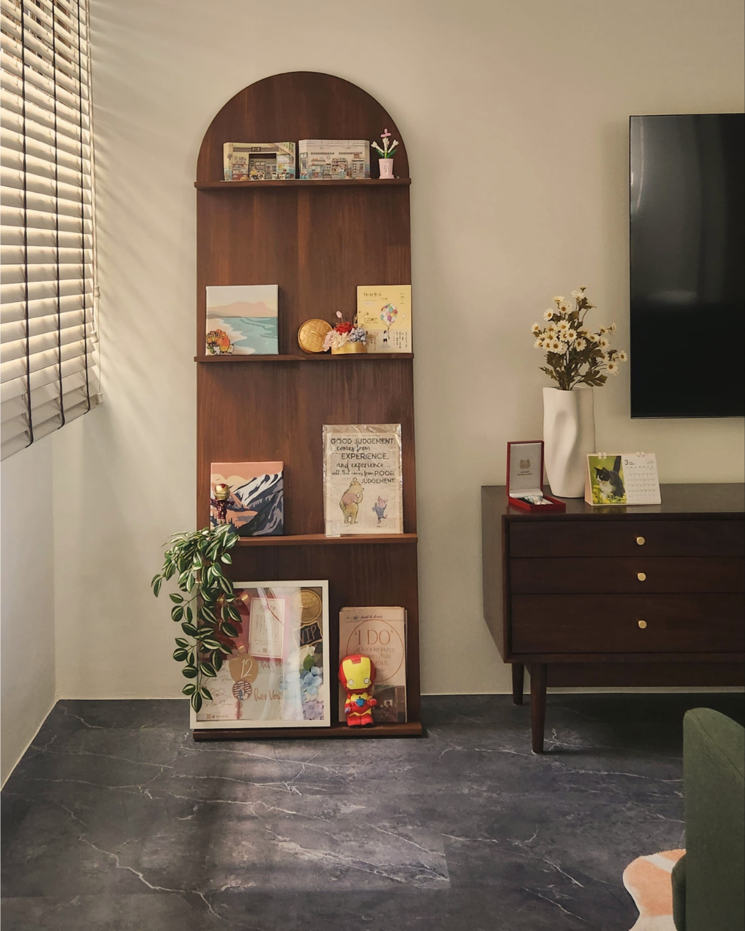 Cozy Up for Movie Nights: The Charm of Full-Height Glass Doors - Wooden bookshelf, arched shelf, decorative items, framed