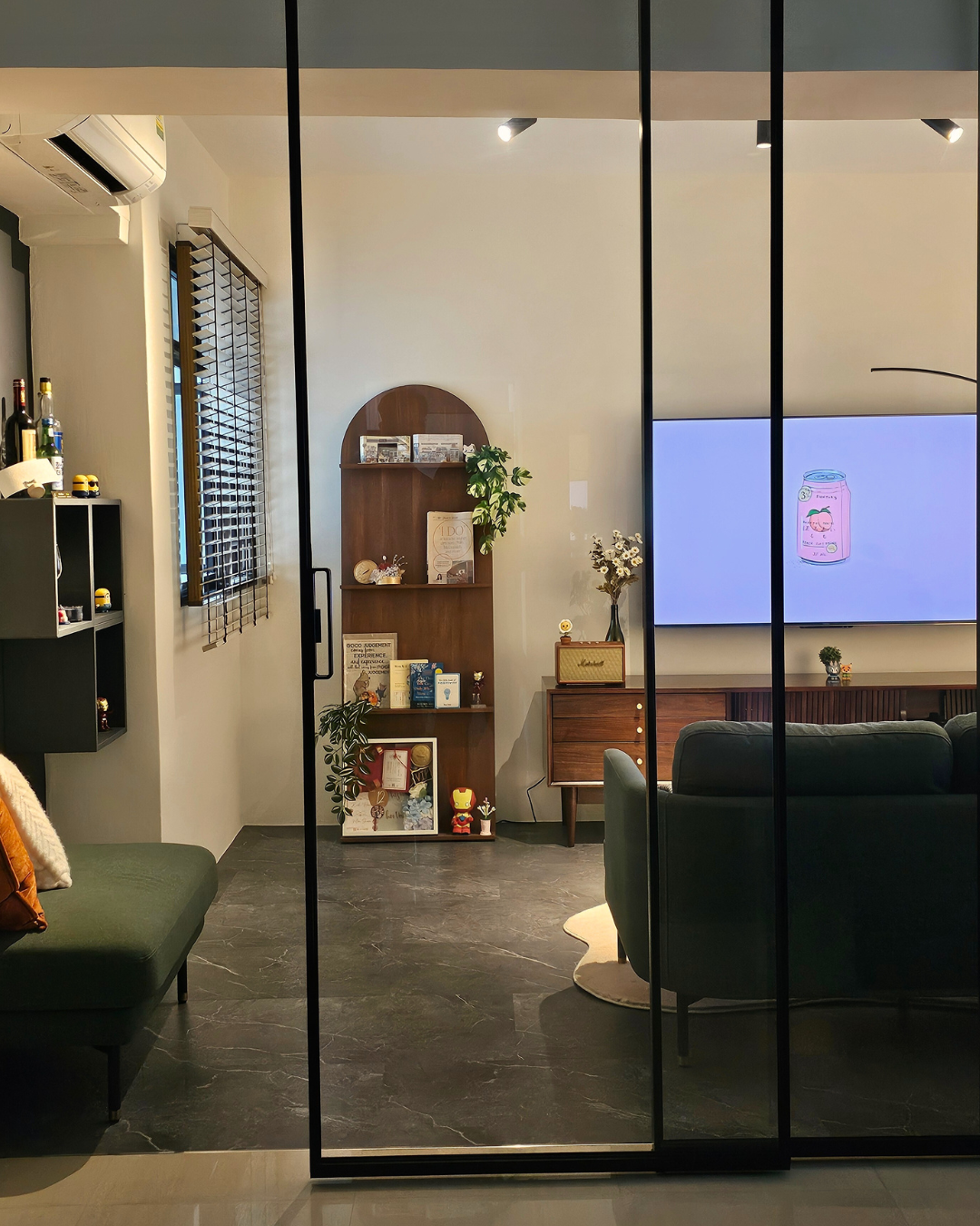 Cozy Up for Movie Nights: The Charm of Full-Height Glass Doors - Modern living room, cozy seating area, glass doors
