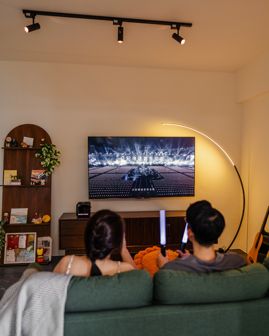 Cozy Up for Movie Nights: The Charm of Full-Height Glass Doors - Modern living room, cozy atmosphere, two people watching TV