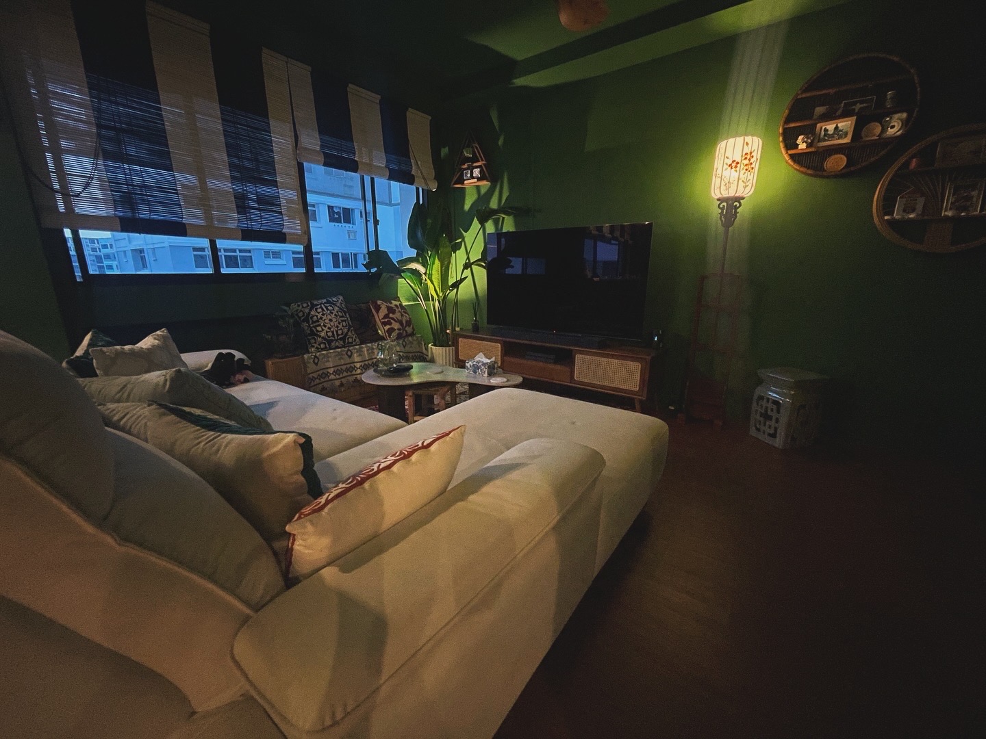 Curated Mix & Match: Our Living Room's Perfect Blend - dimly lit room, cozy living space, modern furniture, beige sectional