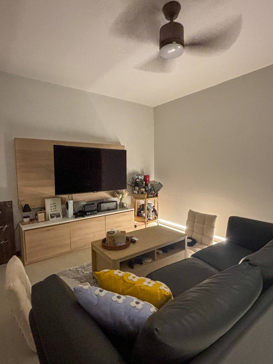 From Day to Night: Japandi Living Space With Collectables - Modern living room, cozy seating area, minimalist design, large