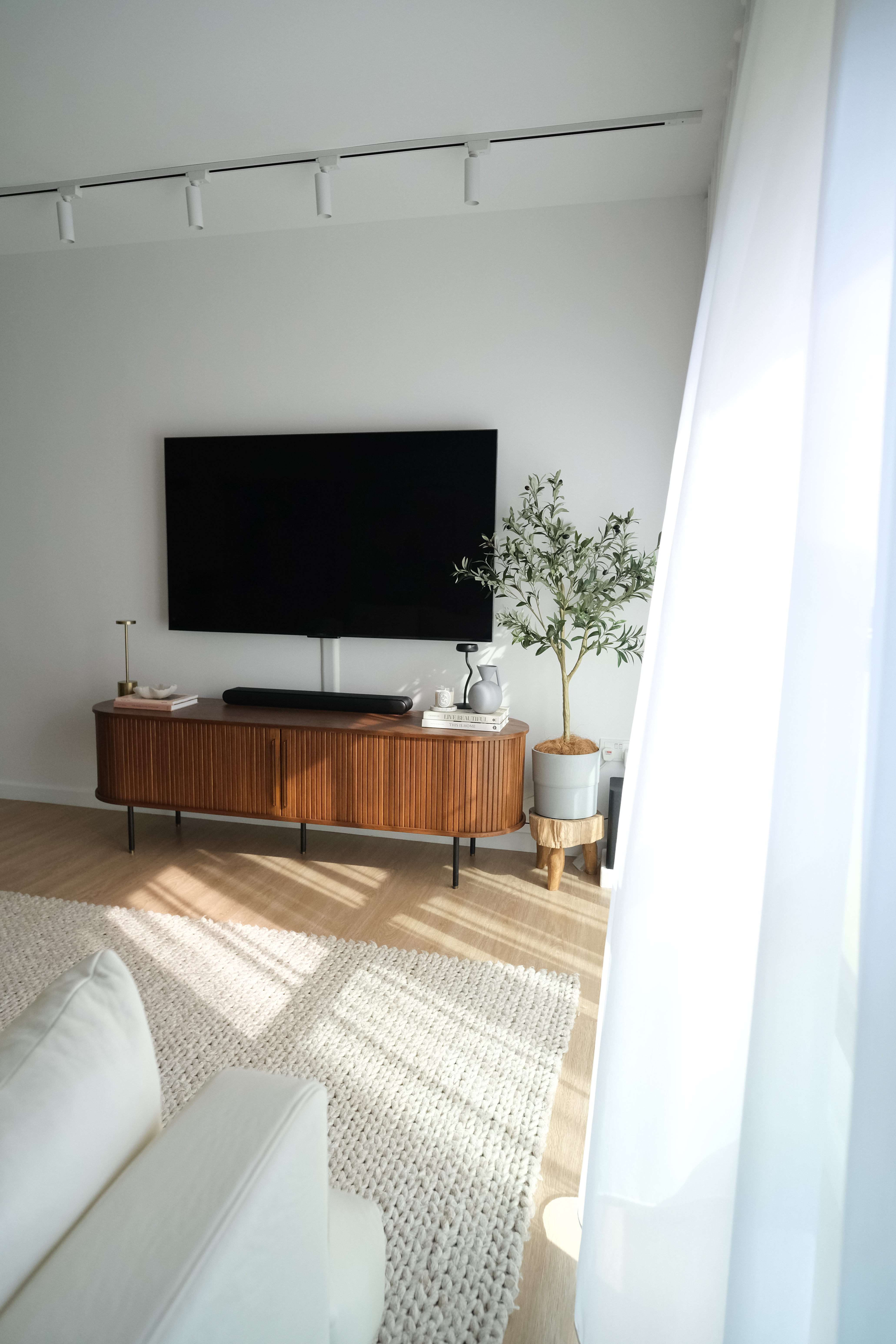 Comfort in Style: How $3.5k Loose Furniture Elevates CozyLiving Room - Modern minimalist living room, sleek wooden console
