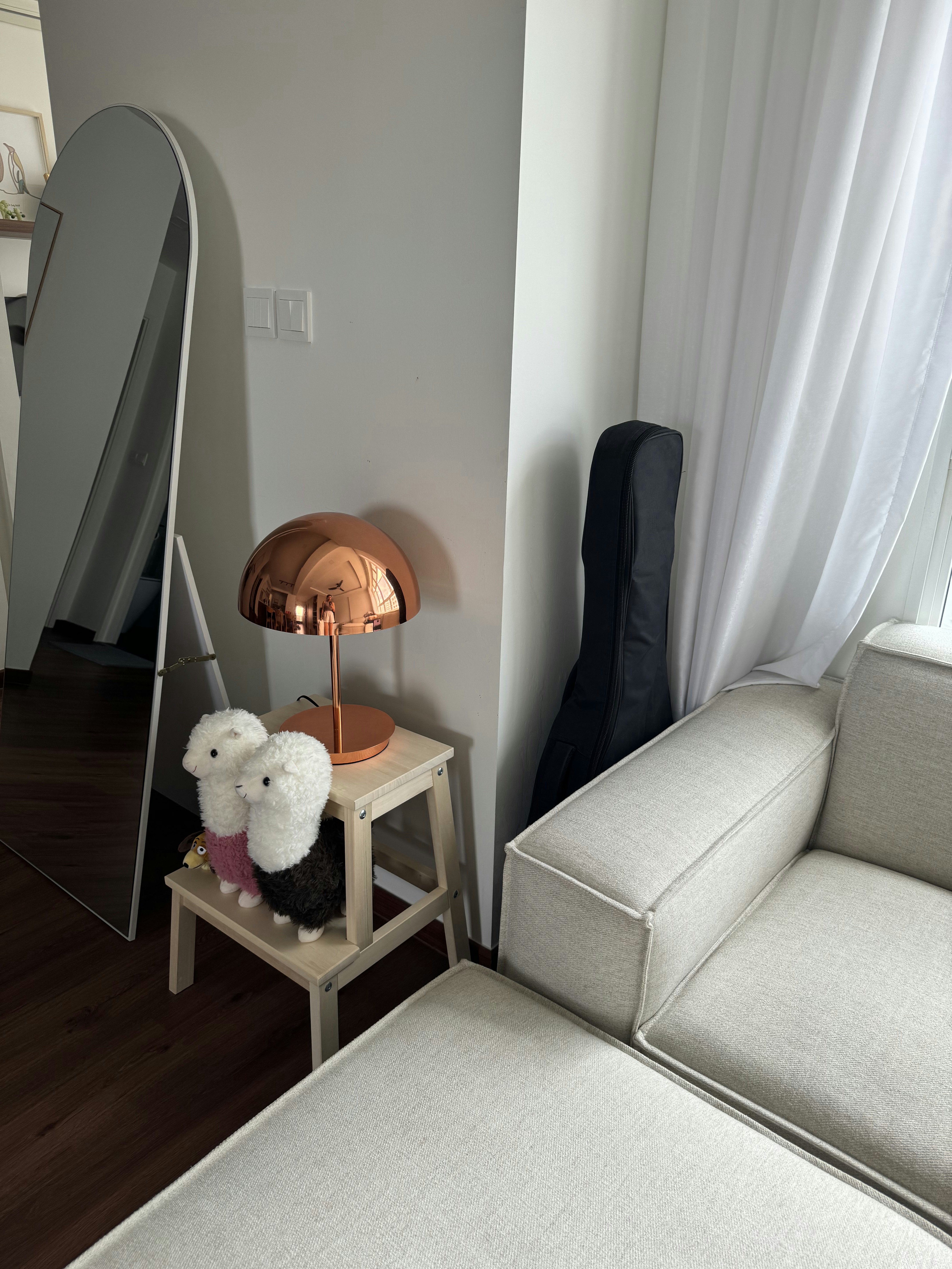 We spent >$3k on a sofa but it was worth!  - Modern minimalist living room, cozy seating area, light gray sofa, wooden side