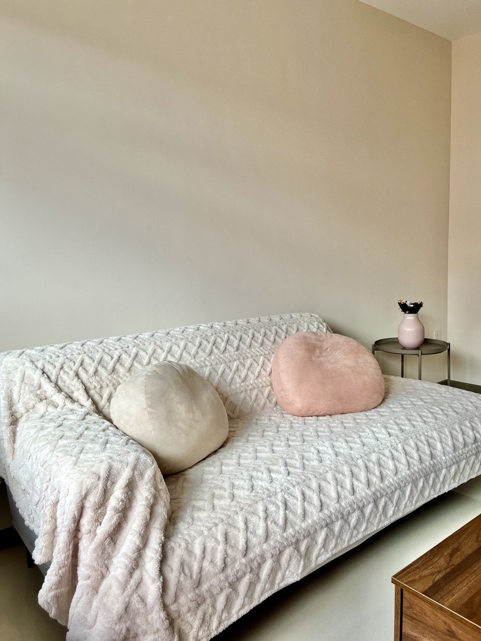 Living Room: Ritz Carlton Inspired Space With Settee in a 3-Room BTO - Cream and soft pink plush pillows, white quilted