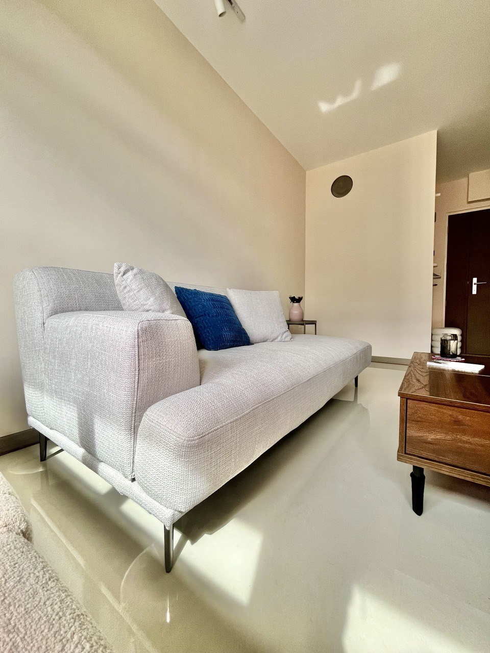 Living Room: Ritz Carlton Inspired Space With Settee in a 3-Room BTO - Light-colored, modern sofa with textured fabric, blue