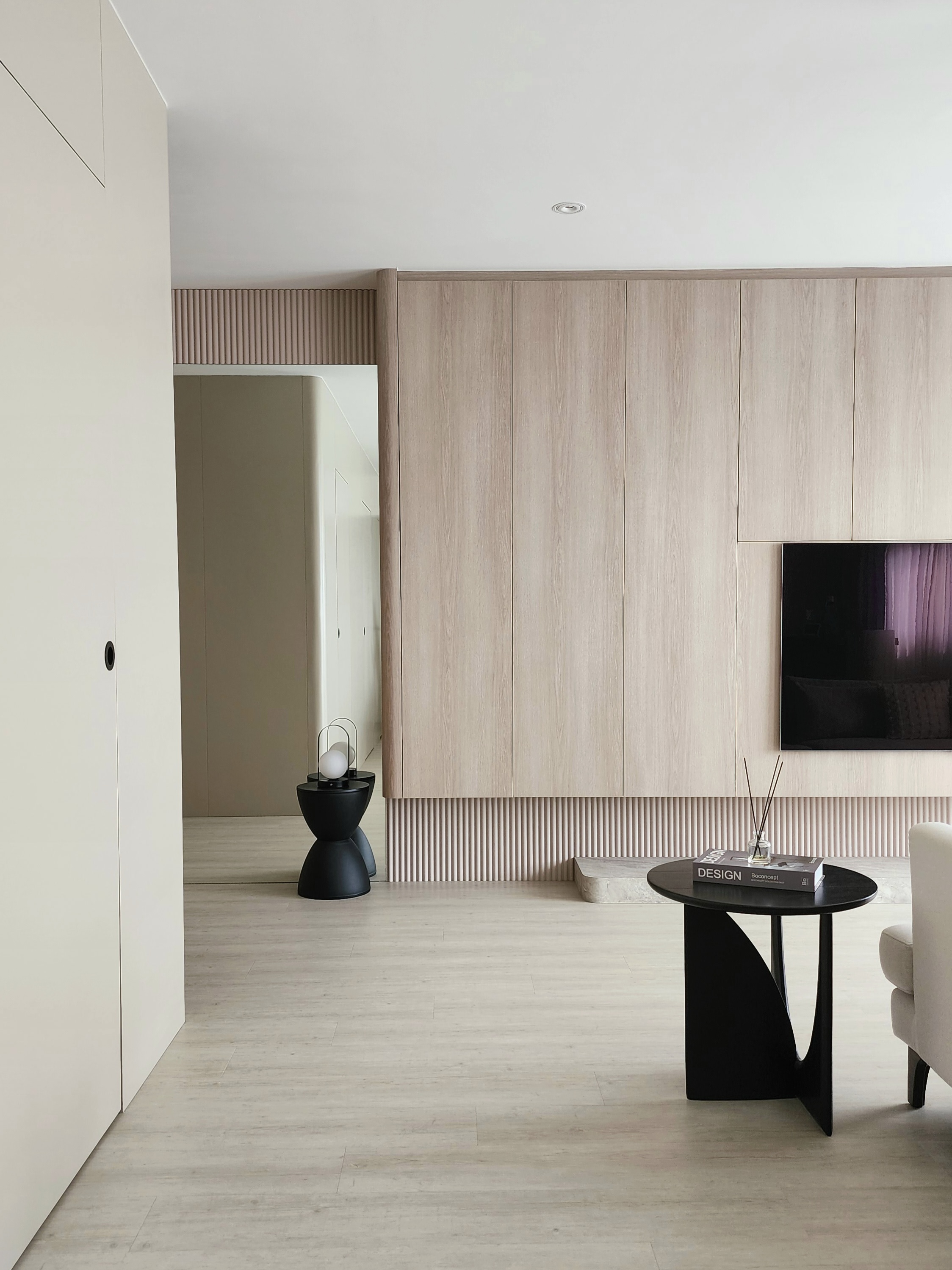 Our Living Area: A Reflection Of Our Innerselves  - Light wood cabinetry, minimalist design, modern decor, sleek furniture