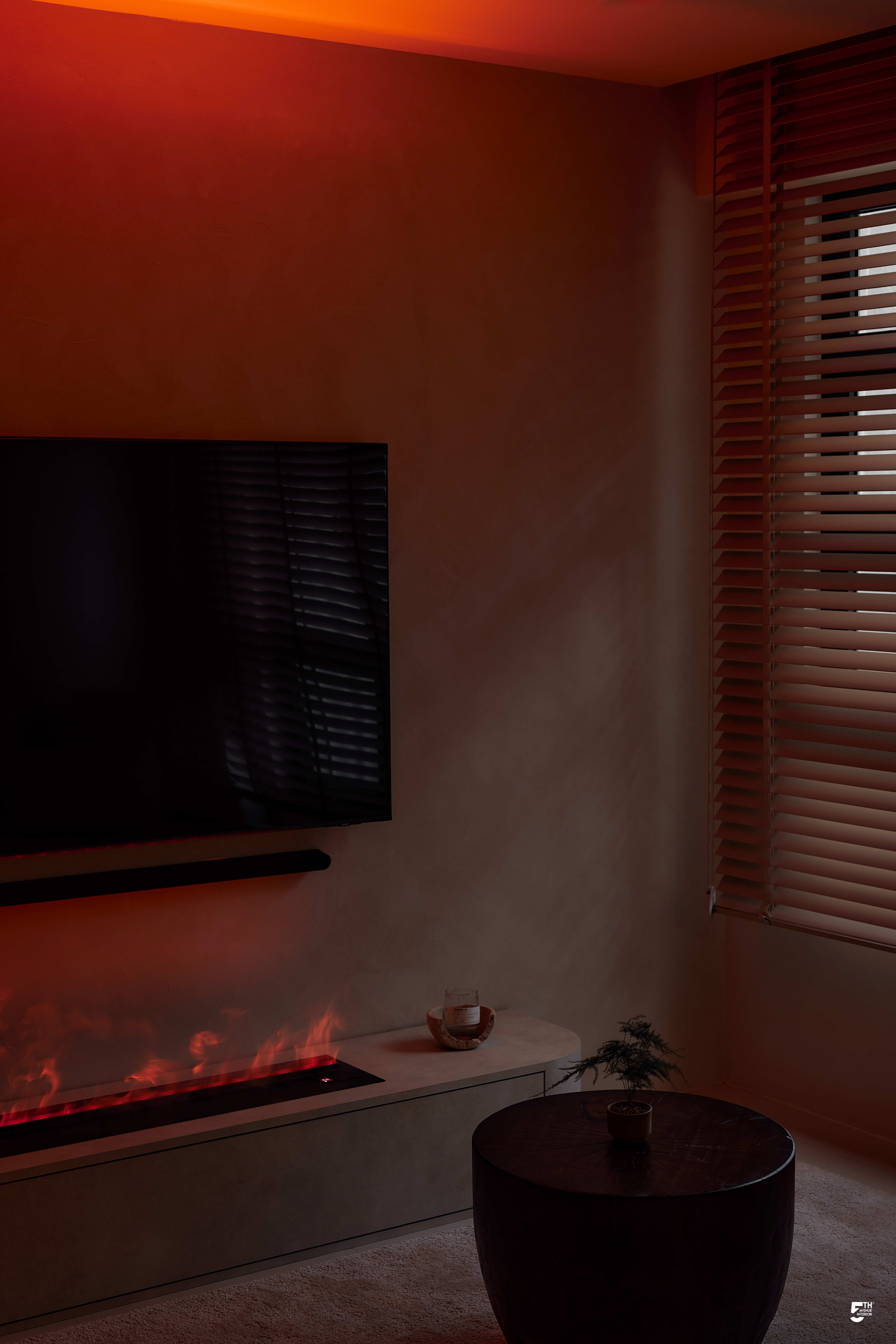 Unwind in our Creamy Limewashed Living Room! - Modern living room, cozy atmosphere, warm lighting, red accent wall