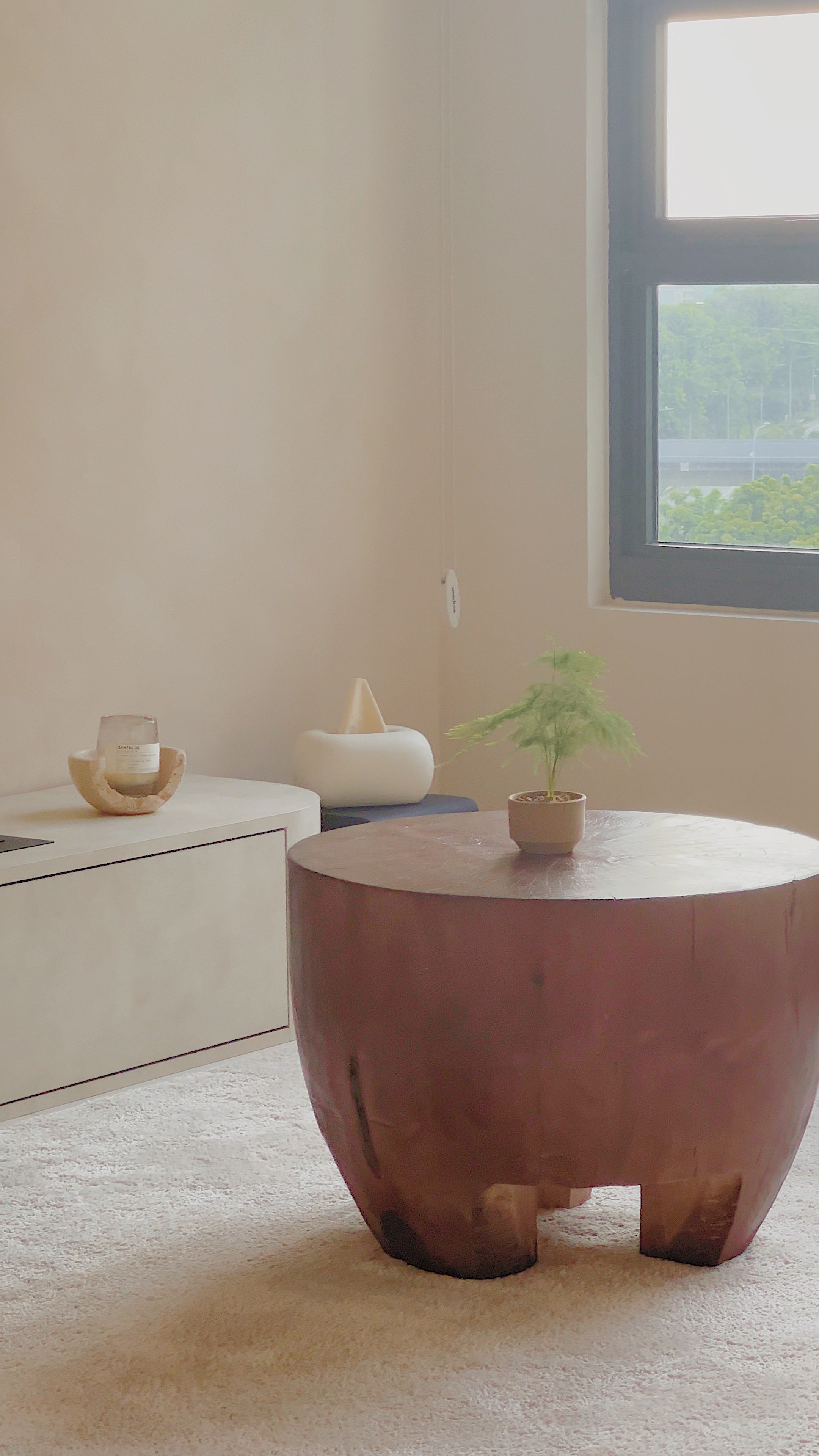 Unwind in our Creamy Limewashed Living Room! - Minimalist room, modern furniture, beige walls, large window, indoor plant