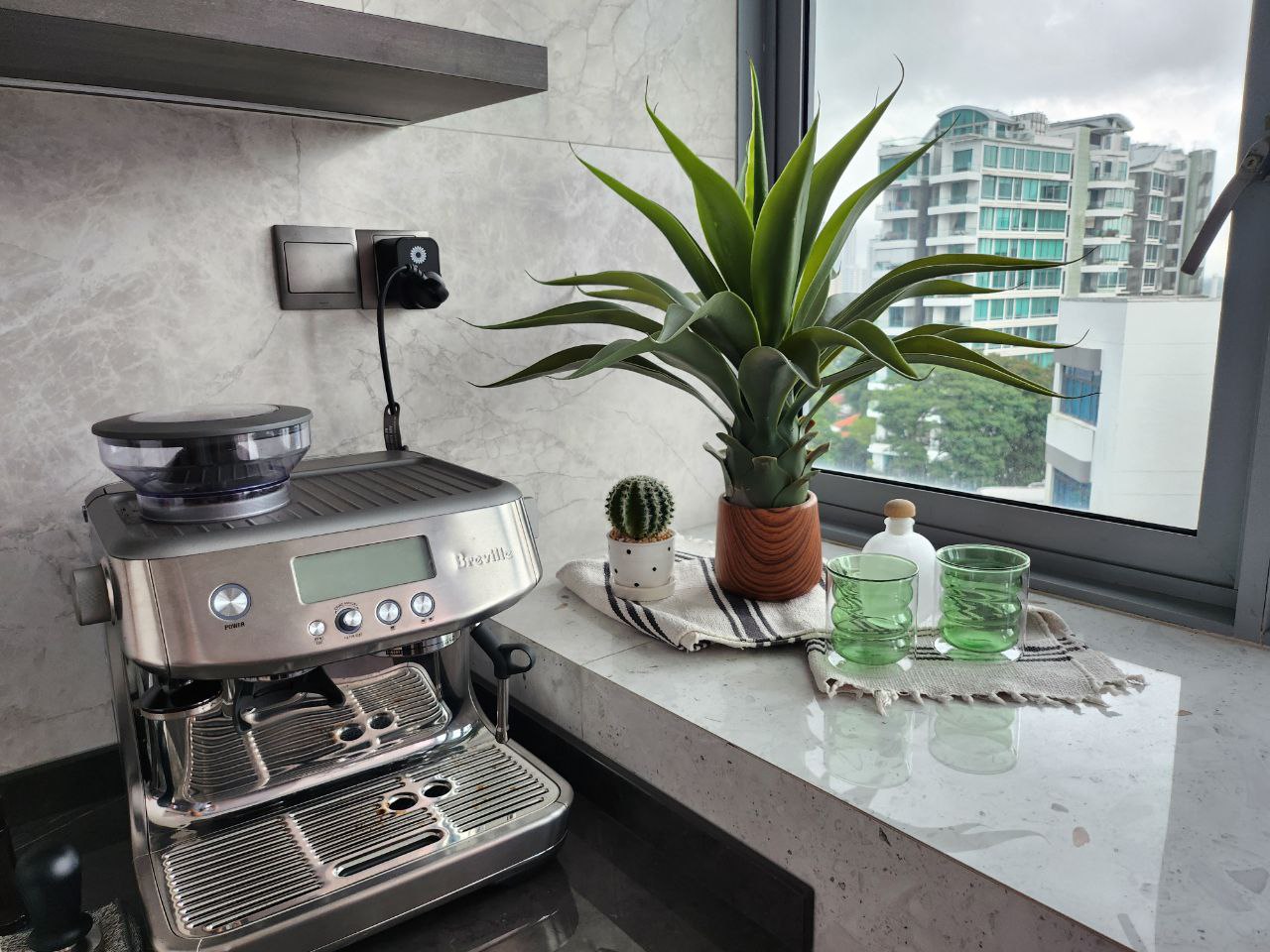 Home Decor Showcase: Green & Modern - Modern kitchen setup, stainless steel espresso machine, coffee grinder, coffee machine