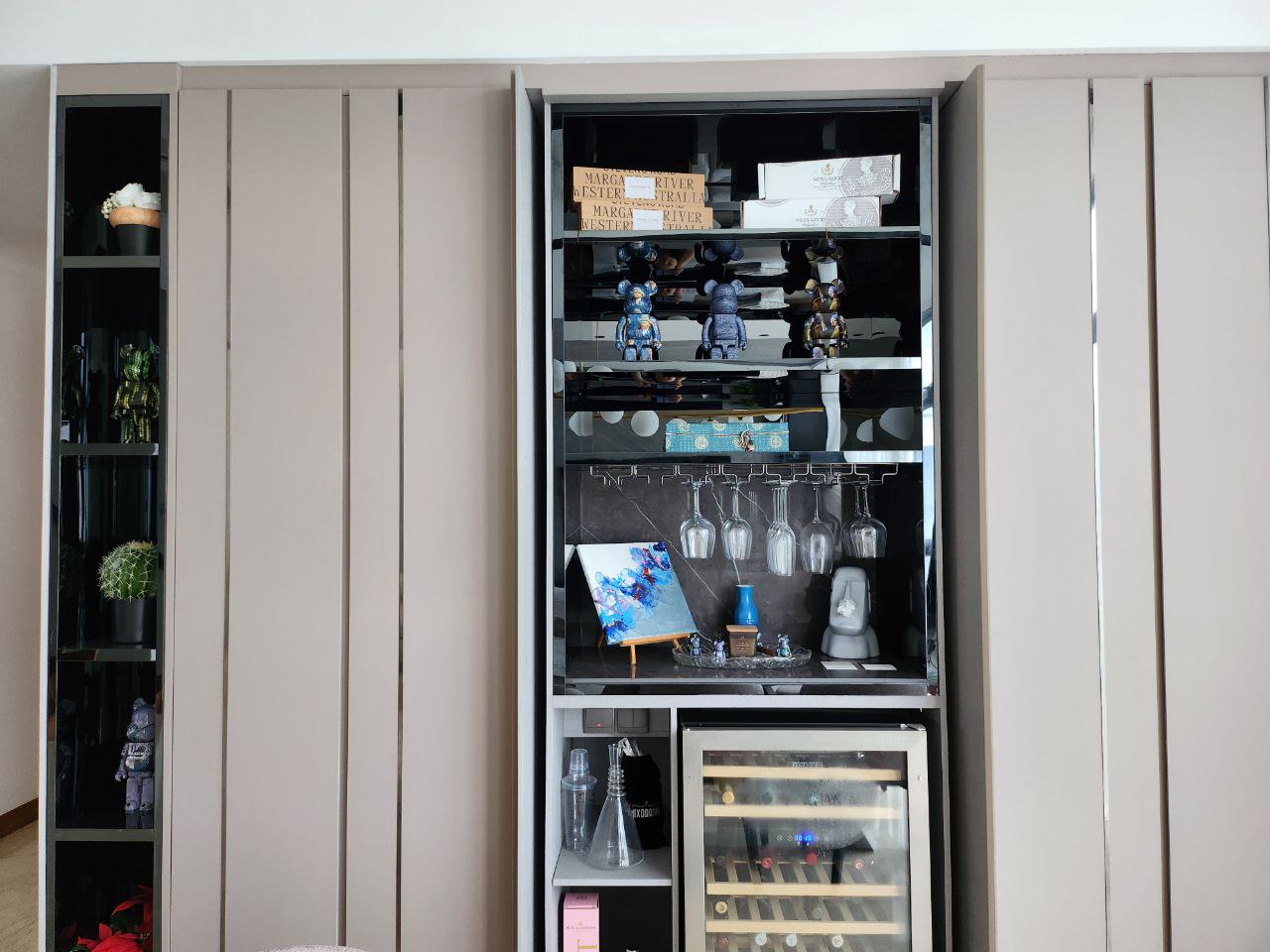 Home Decor Showcase: Green & Modern - Modern open shelving unit, minimalist design, sleek black finish, built-in storage