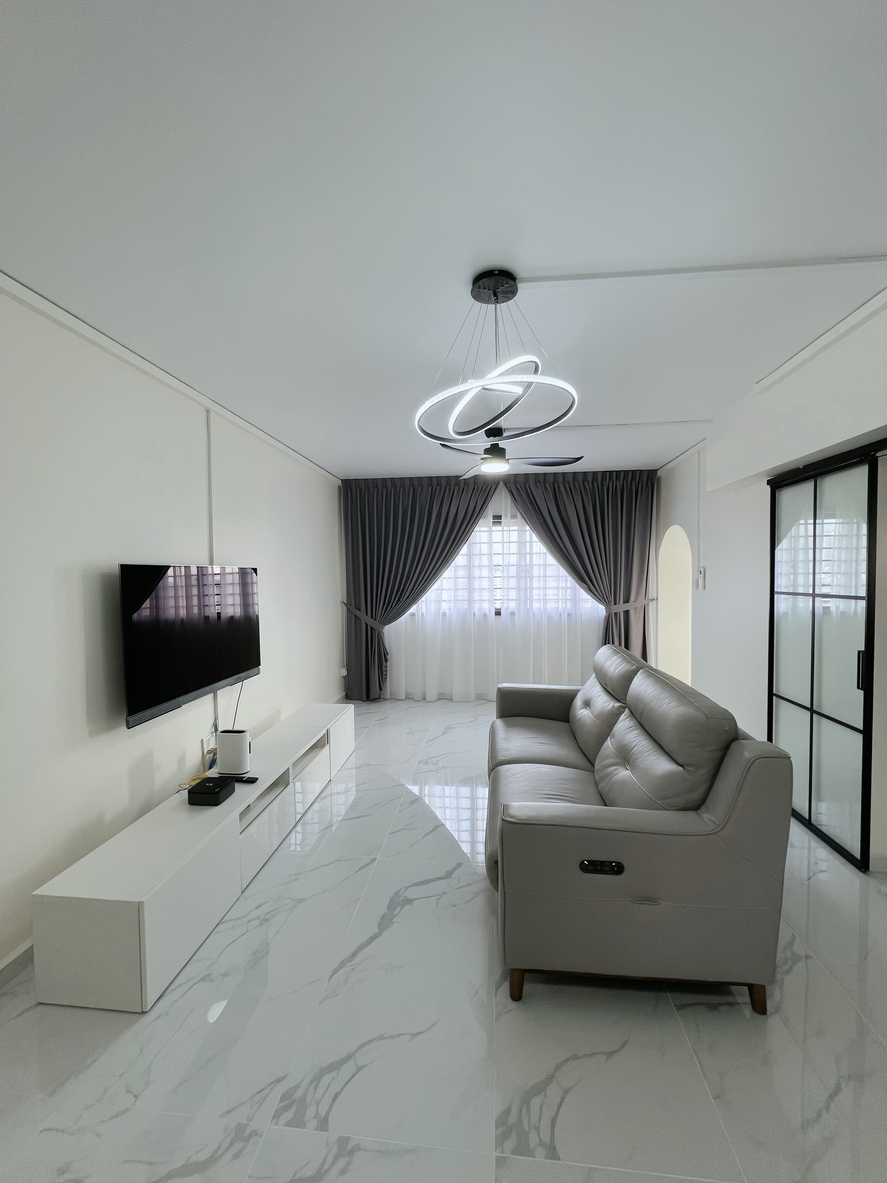 Living Room: Blending cherished furnitures with ample open space  - Modern minimalist living room, sleek entertainment